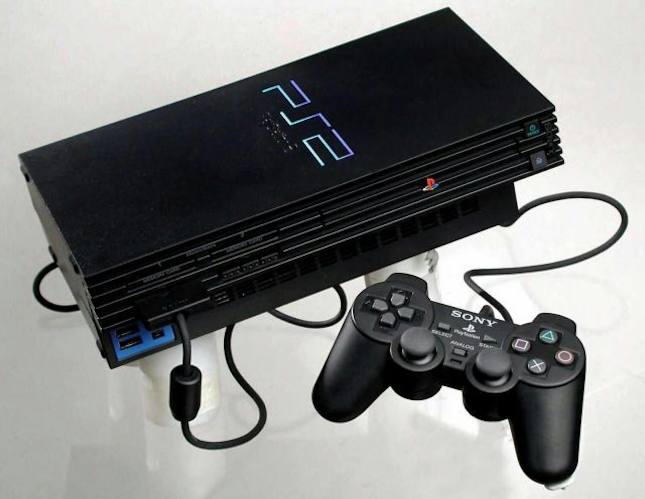 The wildly popular Sony Playstation 2 game console hit stores on Oct. 26, but a shortage of electronic parts has slowed production, so many consumers are still empty-handed. The console which is usually sold for $299, is being sold on online auctions sites for anywhere from $400 to $2000. Some consumers are so desperate to have the system for Christmas that they have been keeping the PlayStation 2s they've rented from video-rental chains such as Blockbuster. Some websites have been charged with