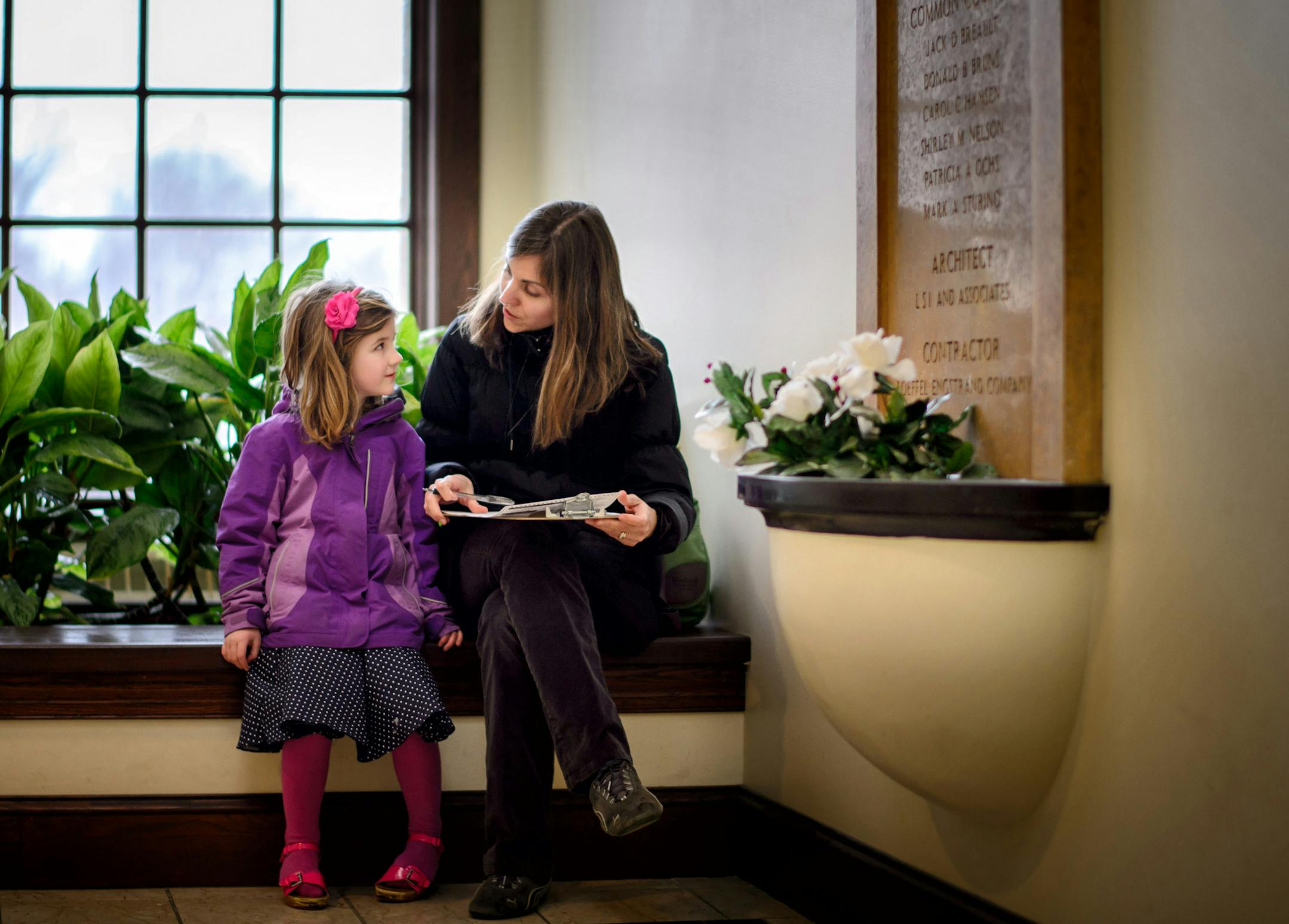 Kate Langenohl voted early with her daughter Julia, 4, at Hudson City Hall. ] GLEN STUBBE * gstubbe@startribune.com Wednesday, March 23, 2016