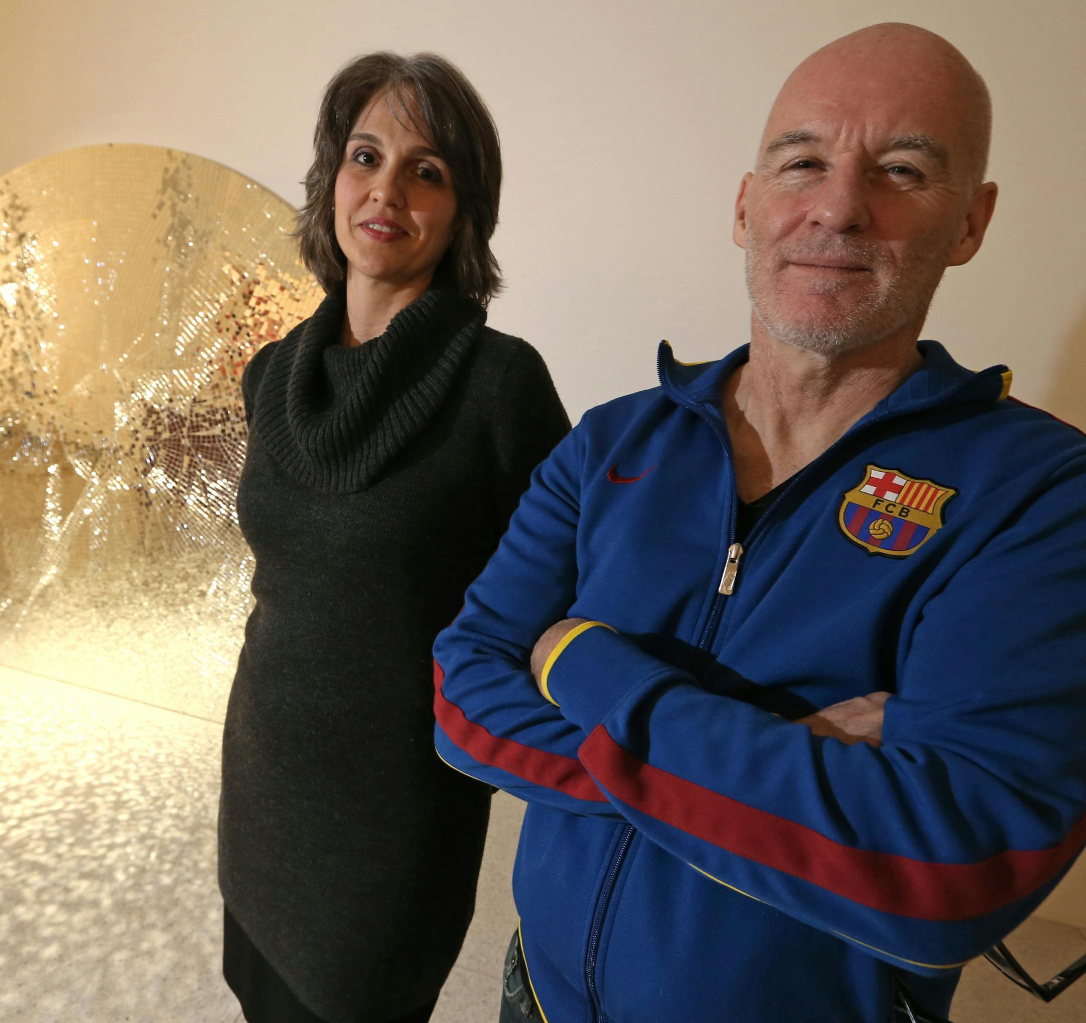 Walker Art Center director Olga Viso and artist Jim Hodges with "Movements (Stage II)", a 2006 mosaic made from bits of mirror.