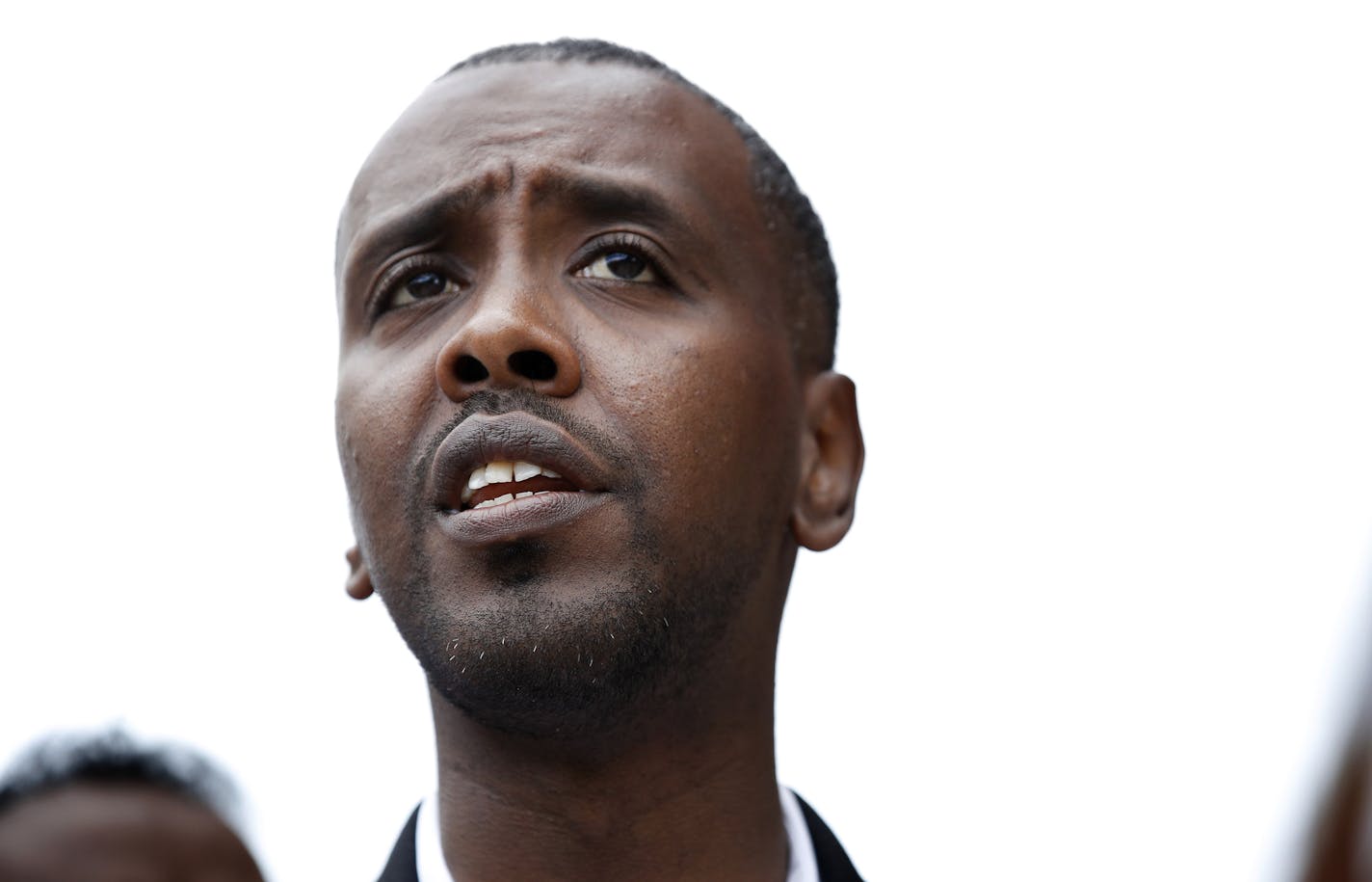 Minneapolis City Council Member Abdi Warsame held a press conference at the Darul Quba Cultural Center on Sunday. ] CARLOS GONZALEZ &#x2022; cgonzalez@startribune.com - July 23, 2017, Minneapolis, MN, Minneapolis City Council Member Abdi Warsame talks about the Damond shooting, along with members of the East African community.