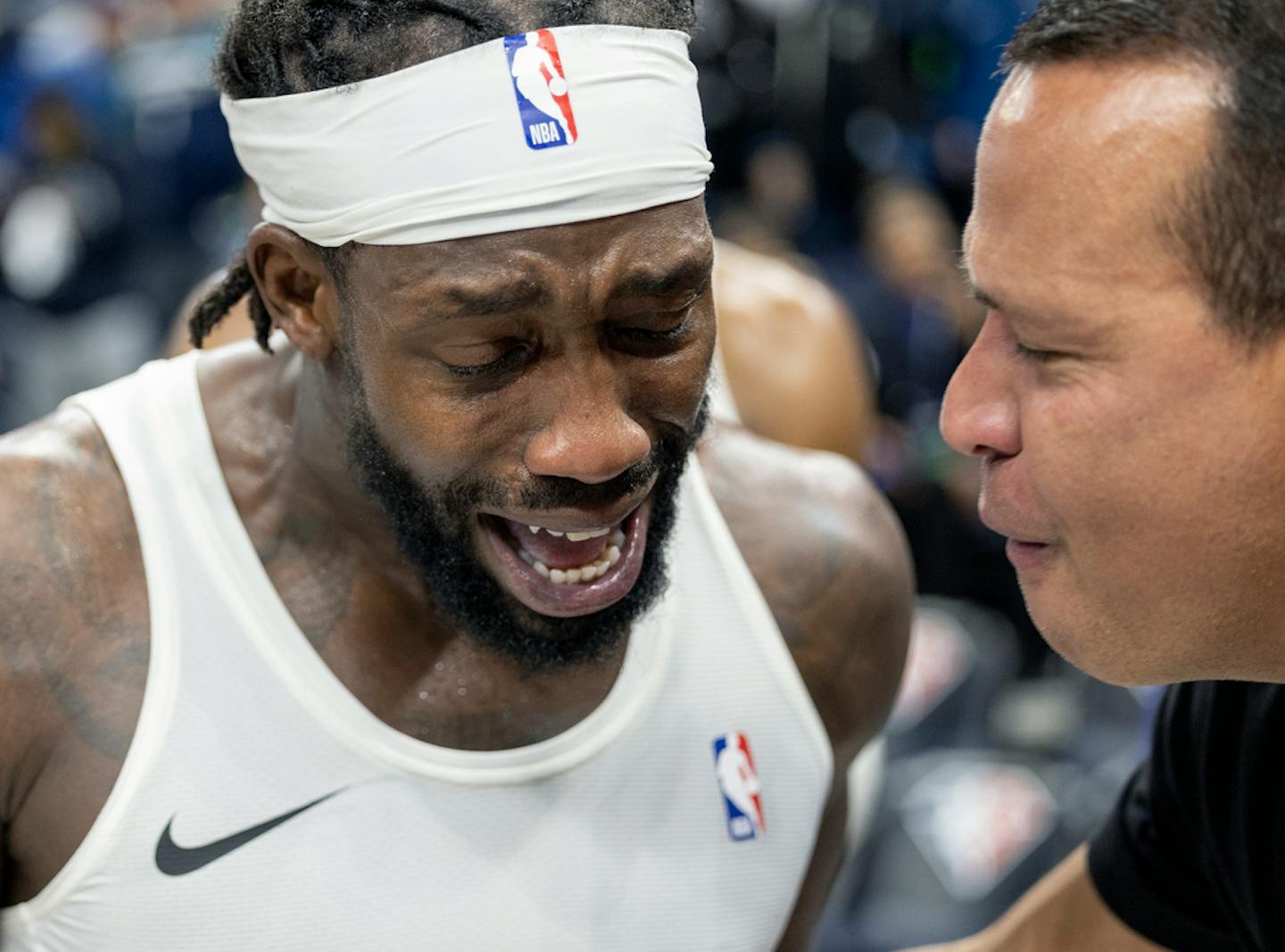 Patrick Beverley (22) of the Minnesota Timberwolves celebrates with Alex Rodriguez at the end of the game Tuesday