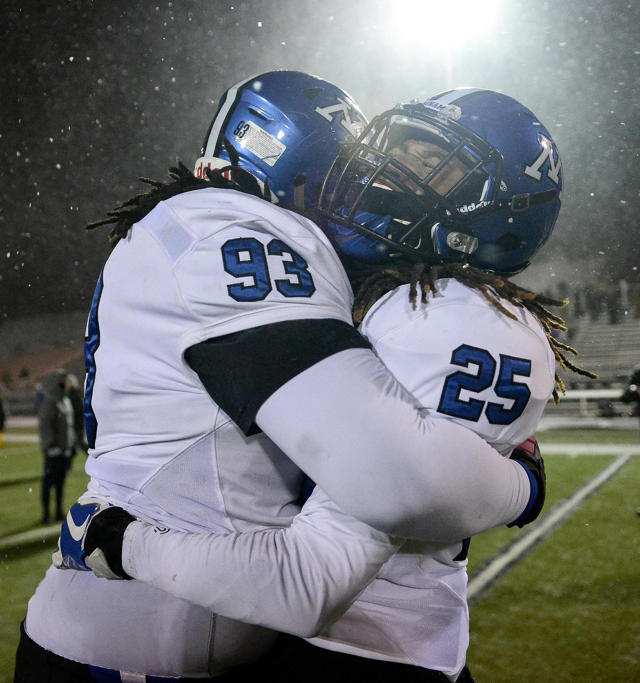 Minnetonka defensive end Samaje Finch-Garrett (93) and Minnetonka cornerback Raheem Brown (25) celebrated their team's 10-6 victory over Prior Lake in the state quarterfinals. ] AARON LAVINSKY ï aaron.lavinsky@startribune.com Prior Lake played Minnetonka in a Class 6A State Tournament quarterfinal game on Friday, Nov. 10, 2017 at Osseo High School in Osseo, Minn.