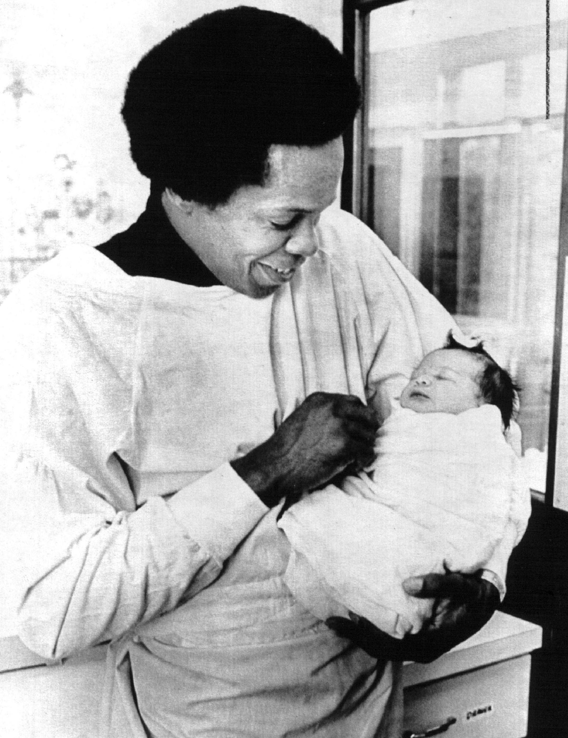 Rod Carew held his newborn daughter, Michelle, in 1978.