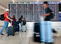 Passengers arrive at Terminal C at Orlando International Airport, Monday, March 18, 2024, in Orlando, Fla.