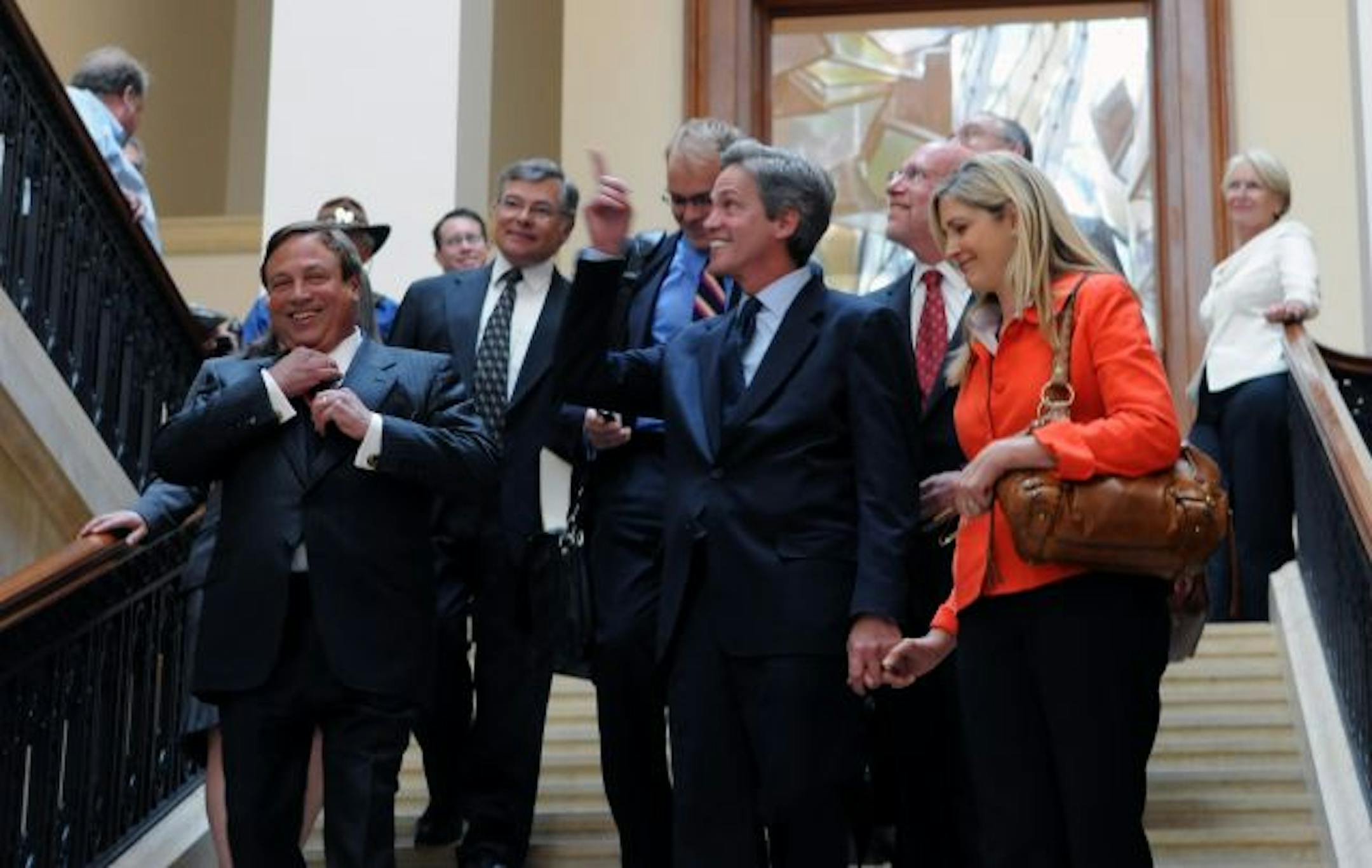 Republican Norm Coleman, accompanied by his wife, Laurie, staff members and attorneys, left the Minnesota Judicial Center courtroom Monday after the Minnesota Supreme Court heard oral arguments in the disputed U.S. Senate race. DFLer Al Franken was not in court. the Minnesota Supreme Court on Monday to throw out a lower-court ruling that handed Democrat Al Franken a win in the state's US Senate race.