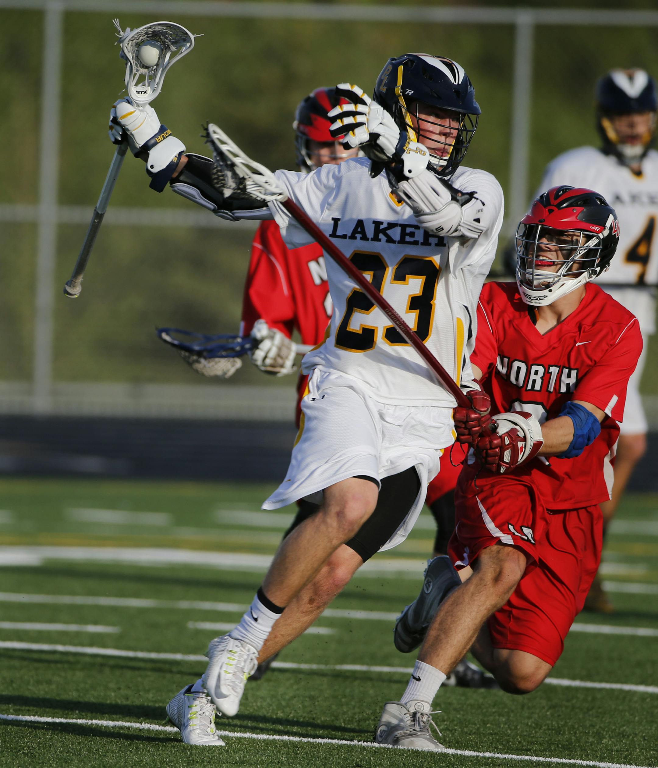 Cullen Sowder (left), a senior and 22-goal scorer for No. 1 Prior Lake, looked to attack against Lakeville North.