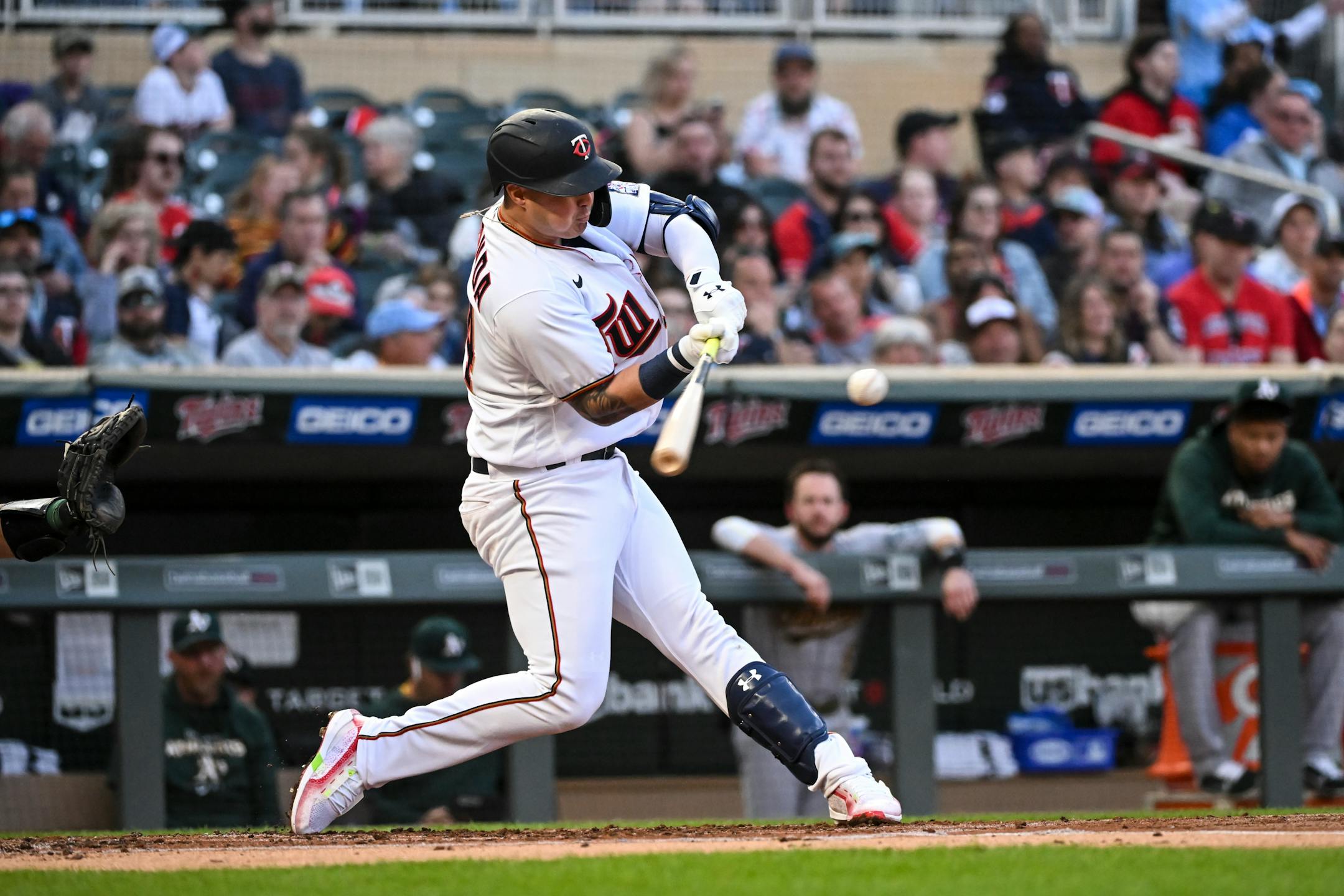 Minnesota Twins first baseman Jose Miranda (64) hits his first career home run in the bottom of the second inning.
