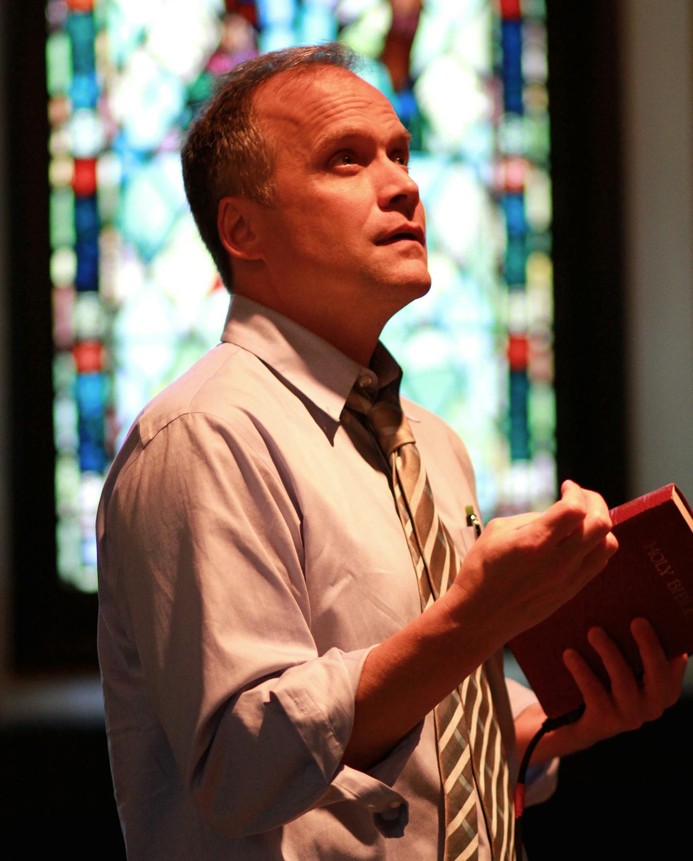 Andrew Erskine Wheeler as Pastor Paul in Walking Shadow Theatre Company's "The Christians." photo by Amy Rummenie