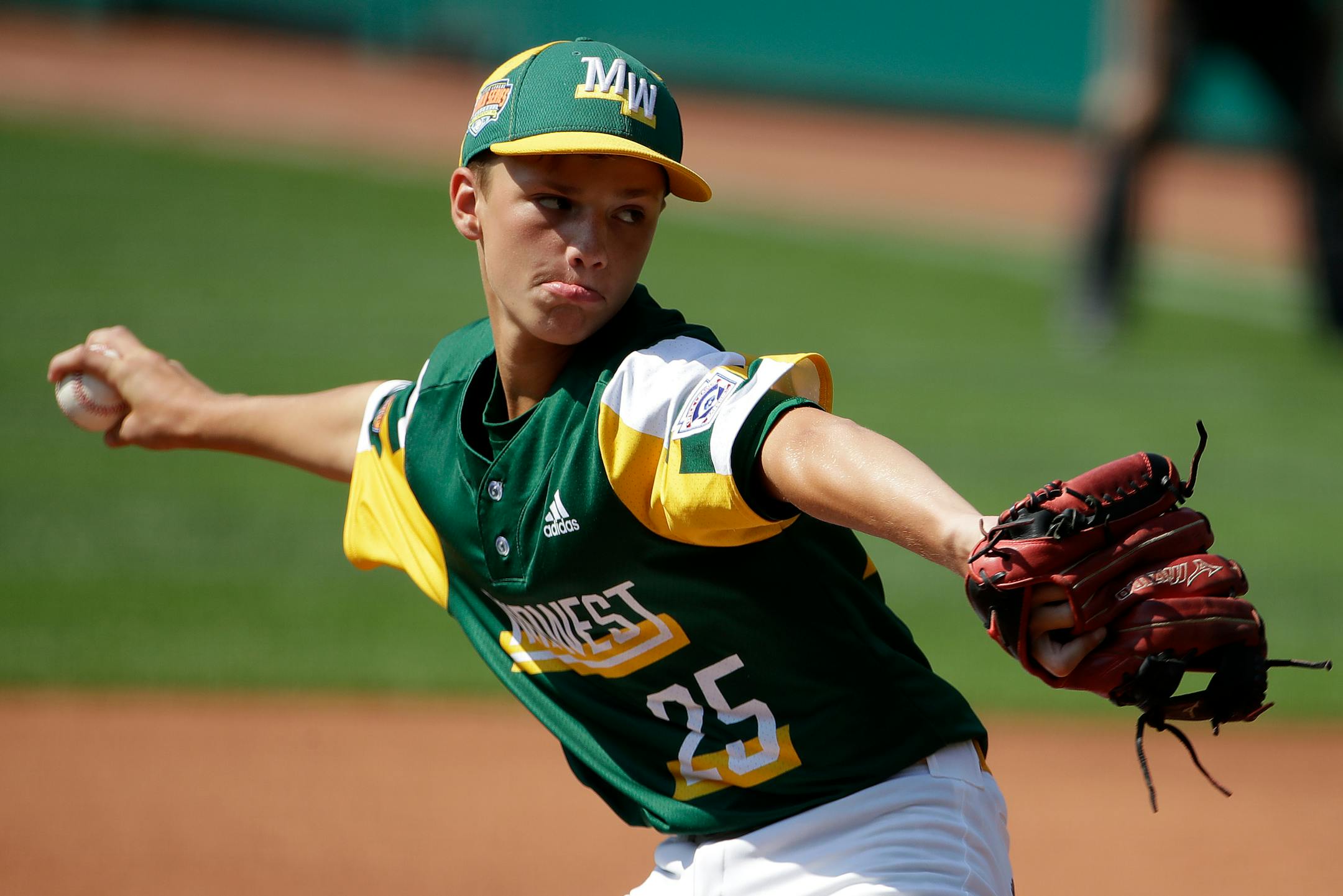 Coon Rapids, Minnesota's Drew Law delivers during the first inning of a baseball game against South Riding, Virginia at the Little League World Series tournament in South Williamsport, Pa., Sunday, Aug. 18, 2019. Virginia won 11-0. (AP Photo/Gene J. Puskar)