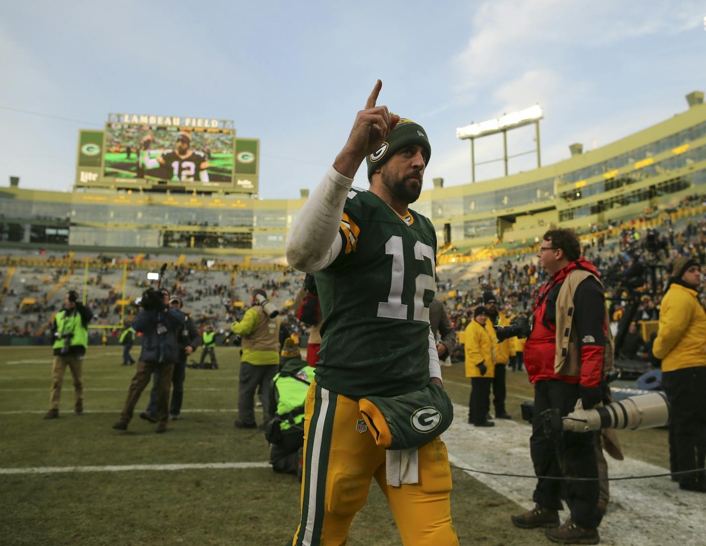 To the chants of "MVP," Green Bay Packers quarterback Aaron Rodgers walked off the field after their win.