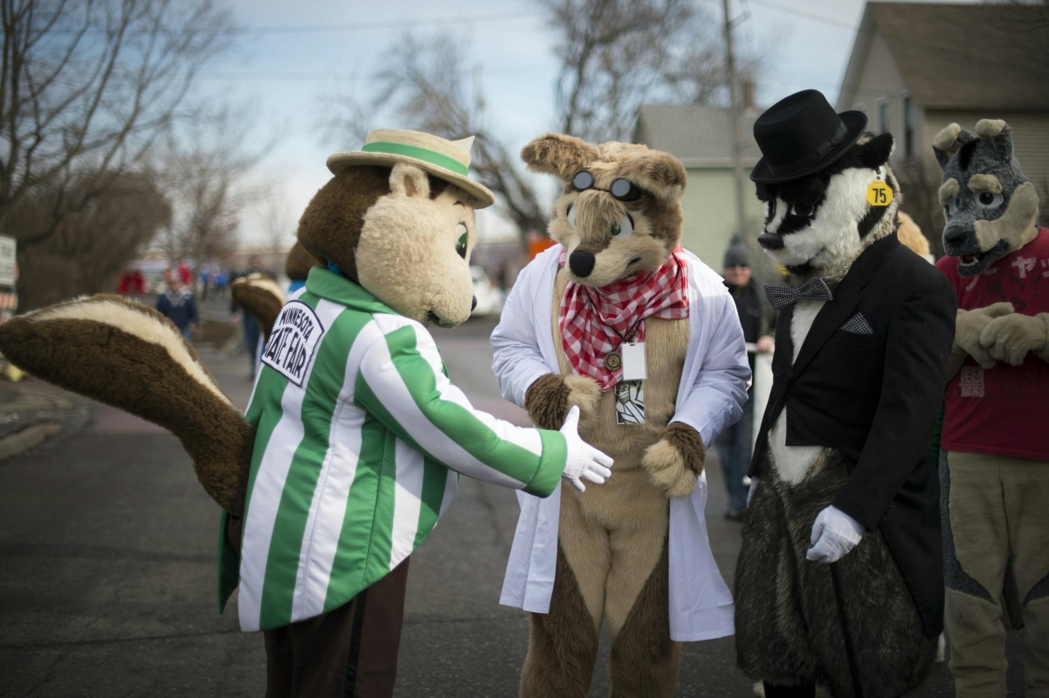 "Fairchild," the Minnesota State Fair gopher, greeted Hyperyote and Birk A. Badger as their paths crossed before the start of the Winter Carnival Parade in late January.