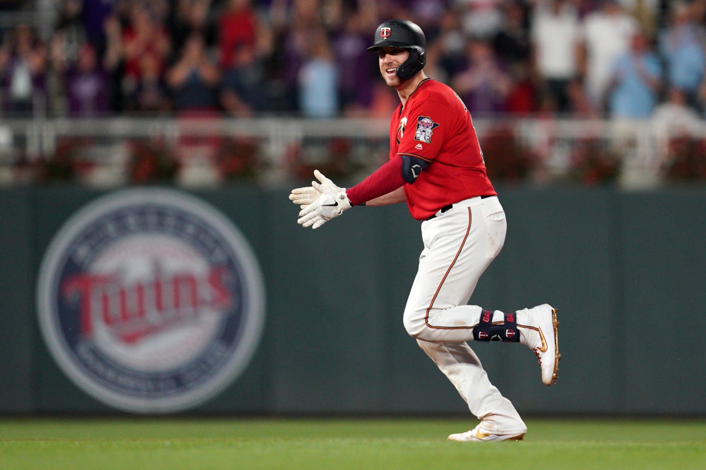 Minnesota Twins catcher Mitch Garver (18) celebrated as he rounded the bases after hitting a game winning, two-run home run in the eighth inning.