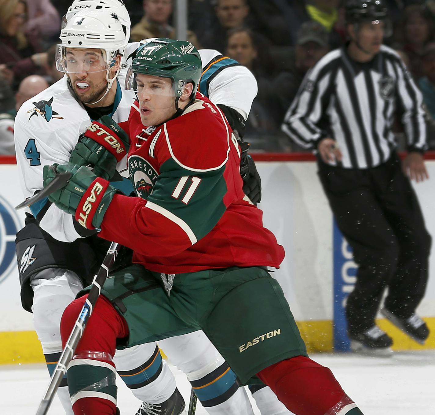 Brenden Dillon (4) and Zach Parise (11) fought for position in the second period. ] CARLOS GONZALEZ cgonzalez@startribune.com - April 5, 2016, St. Paul, MN, Xcel Energy Center, NHL, Hockey, Minnesota Wild vs. San Jose Sharks