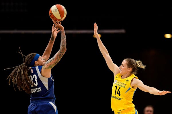 Minnesota Lynx guard Seimone Augustus (33) scored a jumper over Chicago Sky guard Allie Quigley (14) in the second quarter. ] AARON LAVINSKY &#xef; aa