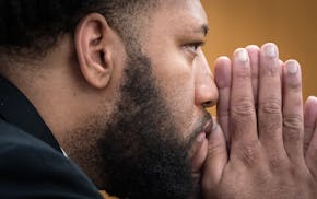 Derrick Thompson listens as Rukiya Gesaade, the sister of victim Sahra Gesaade, gives emotional testimony during his trial in Minneapolis on Friday.