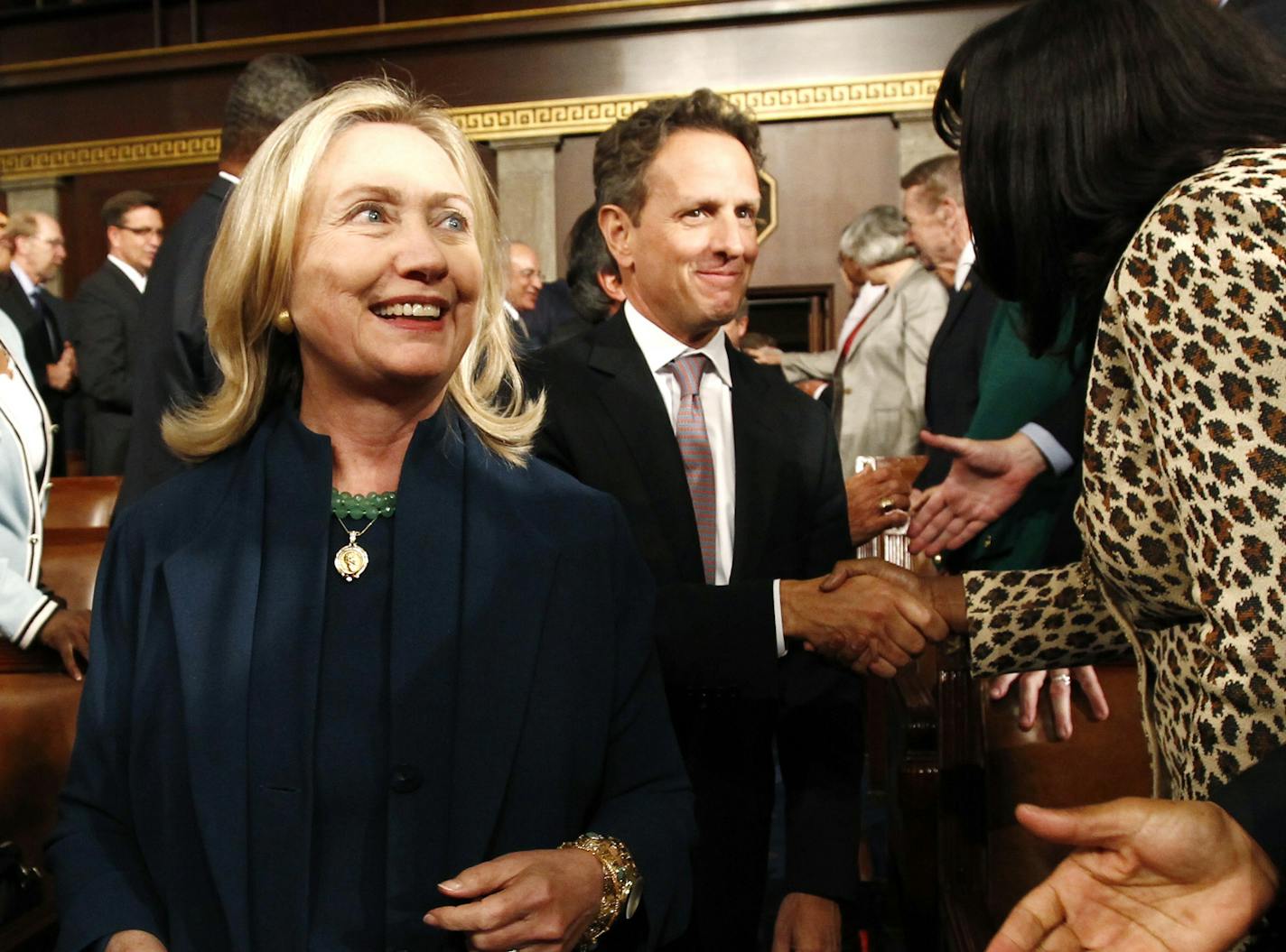 Secretary of State Hillary Rodham Clinton and Treasury Timothy Geithner arrive for before President Barack Obama addresses a joint session of Congress on Capitol Hill in Washington, Thursday, Sept. 8, 2011. (AP Photo/Kevin Lamarque, POOL) ORG XMIT: MIN2016052117244617