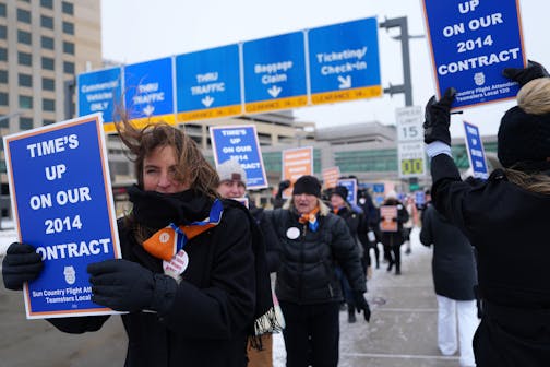 Sun Country flight attendants, who are in negotiations for a new contract, braved the cold weather and impending snowstorm for an informational picket Feb. 22 at MSP Terminal 2.