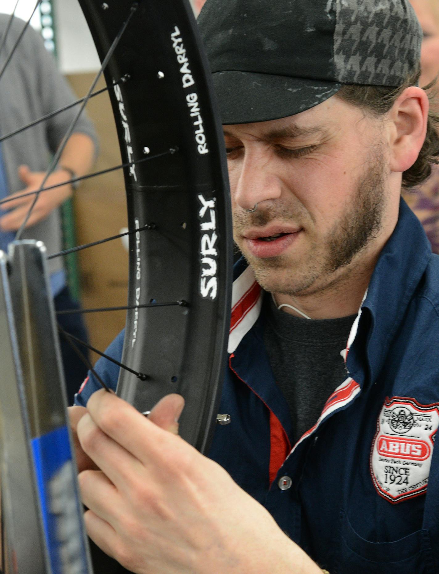 Steve Flagg, an economics major who fixed bikes 40 years ago at the Univiersity of Minnesota, has proved nothing if not that he can make a buck off the "green economy" and pedal power. His Bloomington-based Quality Bicycle Products, grew from 400 to 650 jobs, right through the recession. QBP has started manufacturing high-end "Surly" and "Salsa" brand bicycles in Minnesota, in addition to its nation-spanning parts business . Jake Johnson Production associate in the wheel house eyeballed a fat ti