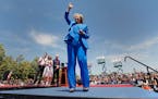 Democratic presidential candidate, former Secretary of State Hillary Rodham Clinton, right, acknowledges supporters as her husband, former President B