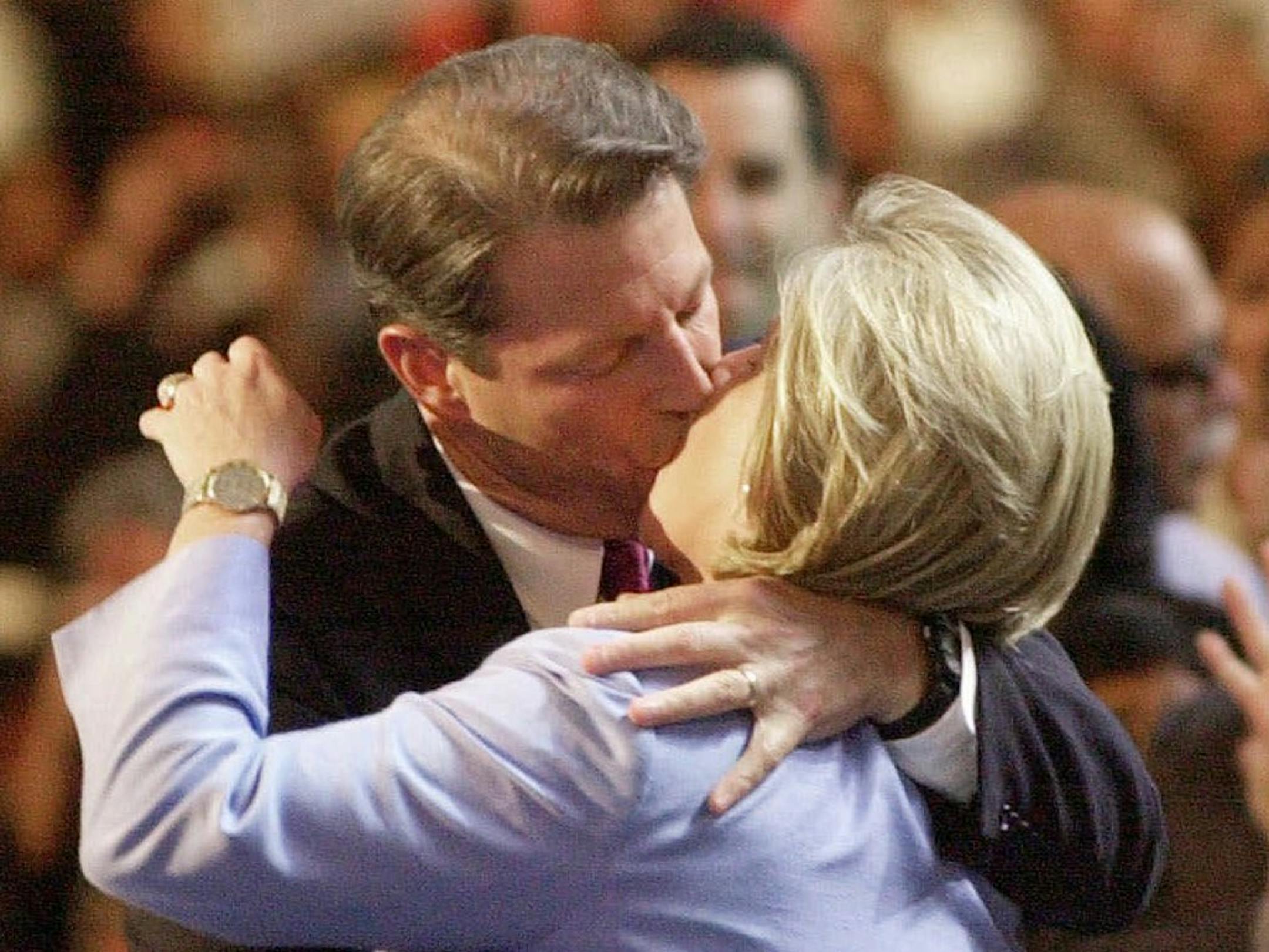 ** FILE ** In this Aug. 17, 2000, file photo, Democratic presidential nominee Al Gore kisses his wife, Tipper on the stage at the Democratic National Convention at the Staples Center in Los Angeles. Al Gore didn't just kiss his wife. He realllllllly kissed his wife. Gore said the kiss was spontaneous, not meant to show he could loosen up. (AP Photo/ David J. Phillip)