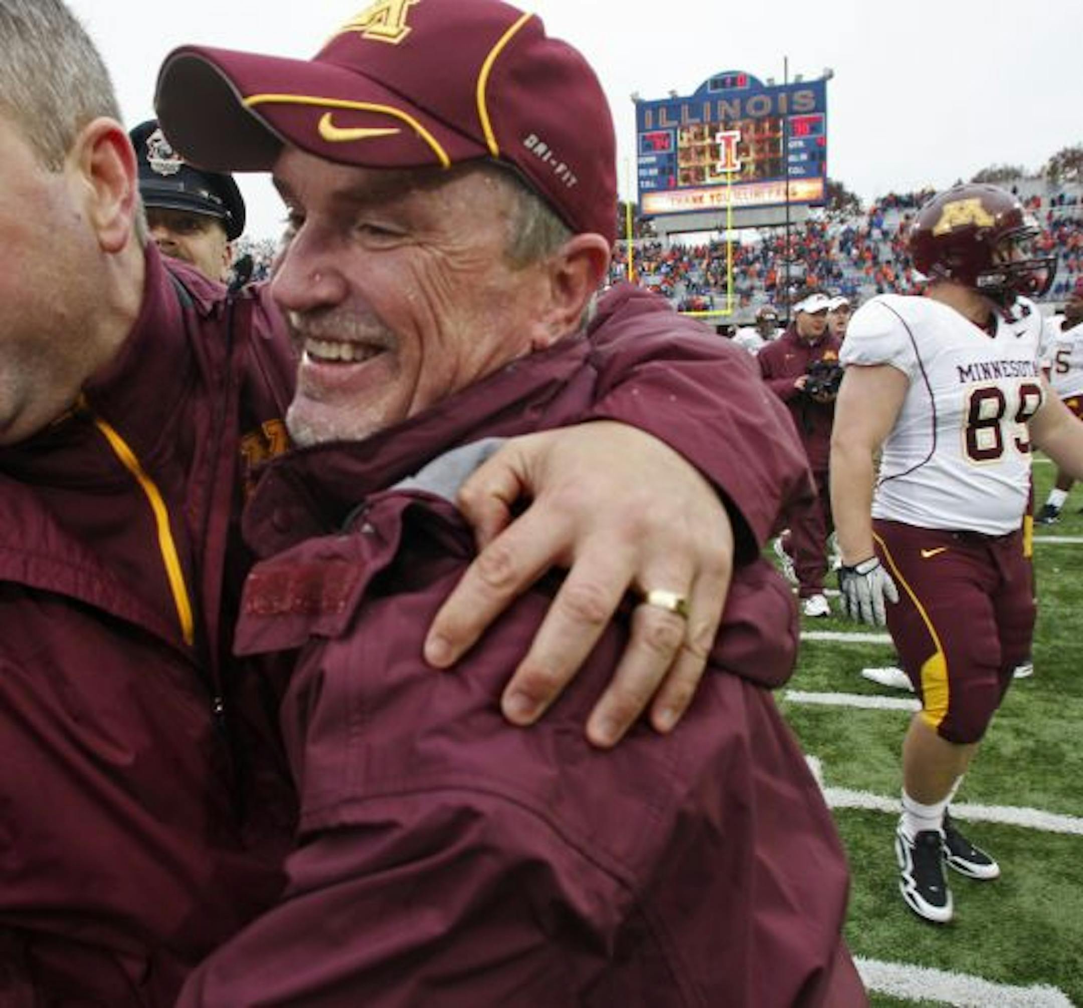 Gophers interim head football coach Jeff Horton got plenty of hugs — and a Gatorade bath — after his team stopped Illinois.