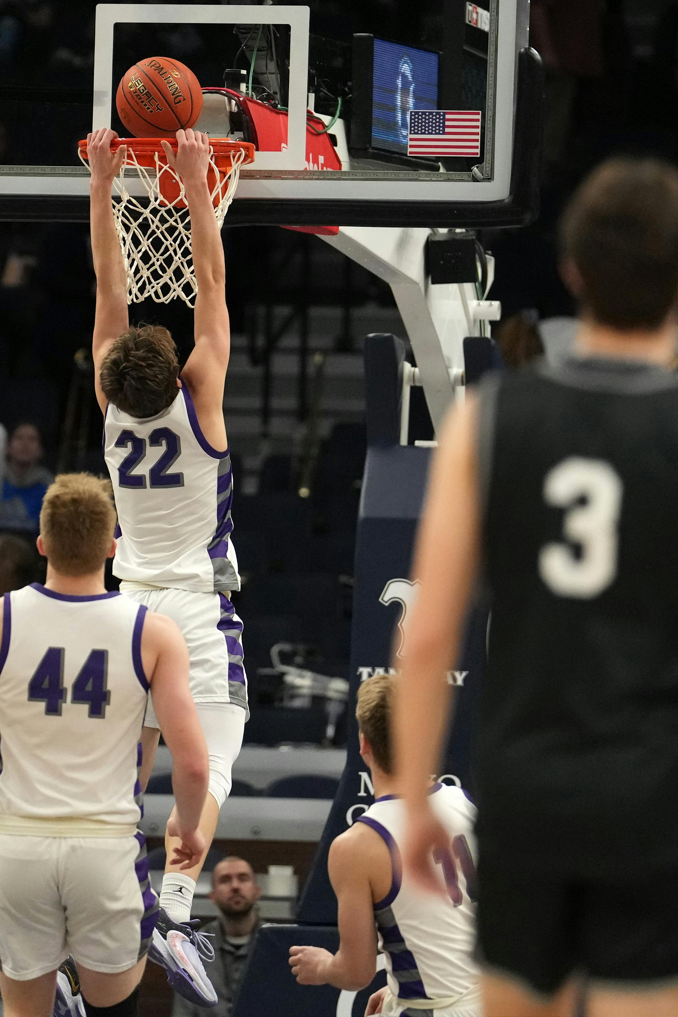 Albany guard Tysen Gerads (22) dunks the ball in the second half.