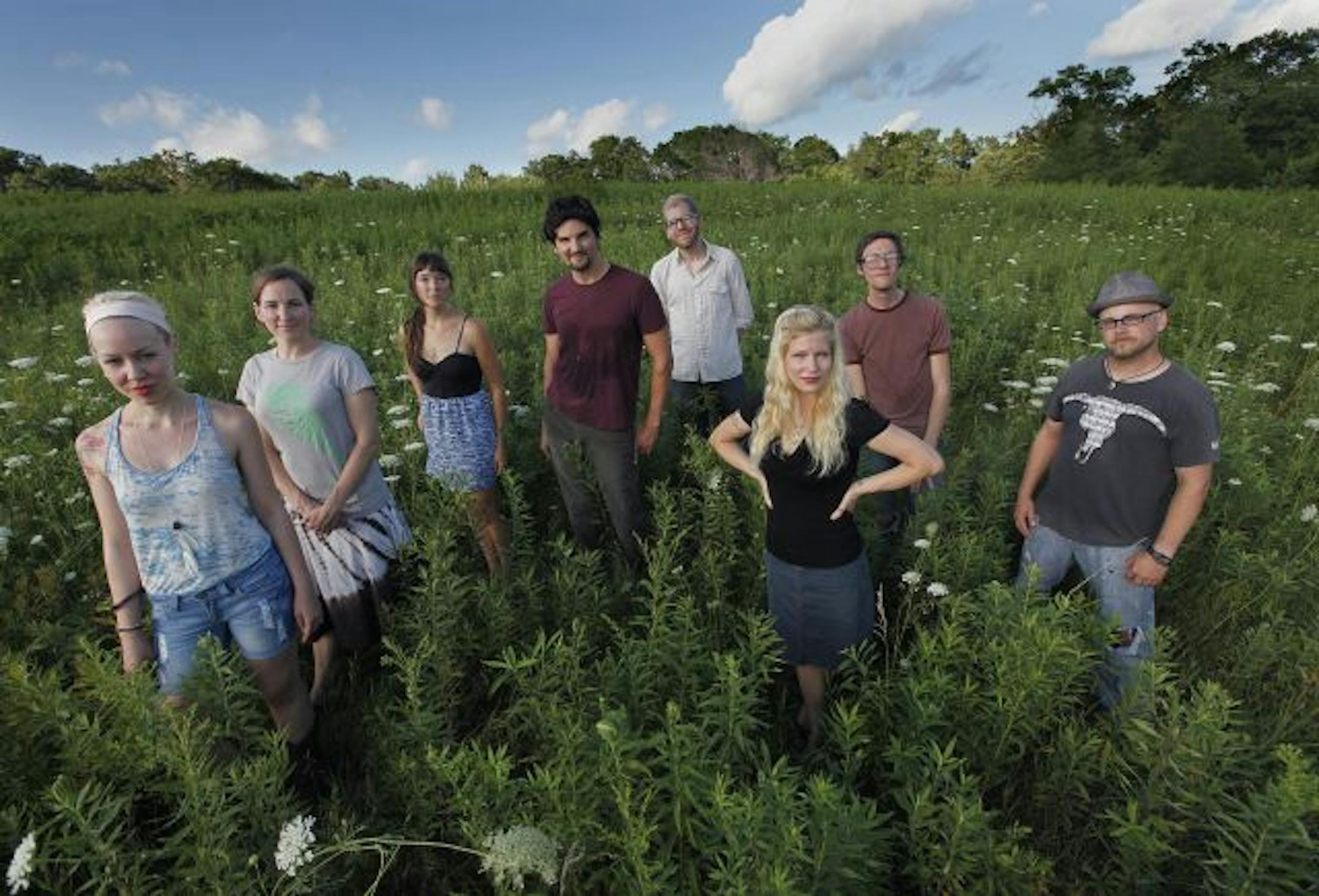 Cloud Cult frontman Craig Minowa (center) and his painter wife Connie (third from right) moved to Viroqua, Wis., last fall before the birth of their son Nova, whose brother's death has defined the band's music.