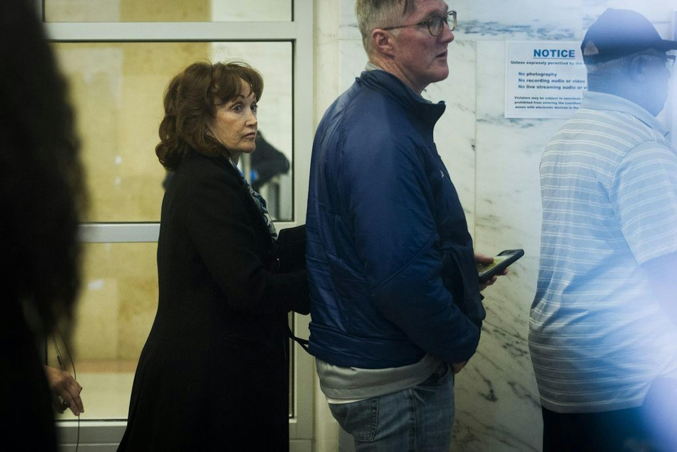 Paul Manafort's wife, Kathleen Manafort, waits to enter the U.S. District Court for Manafort's sentencing hearing in Washington, Wednesday, March 13, 2019.