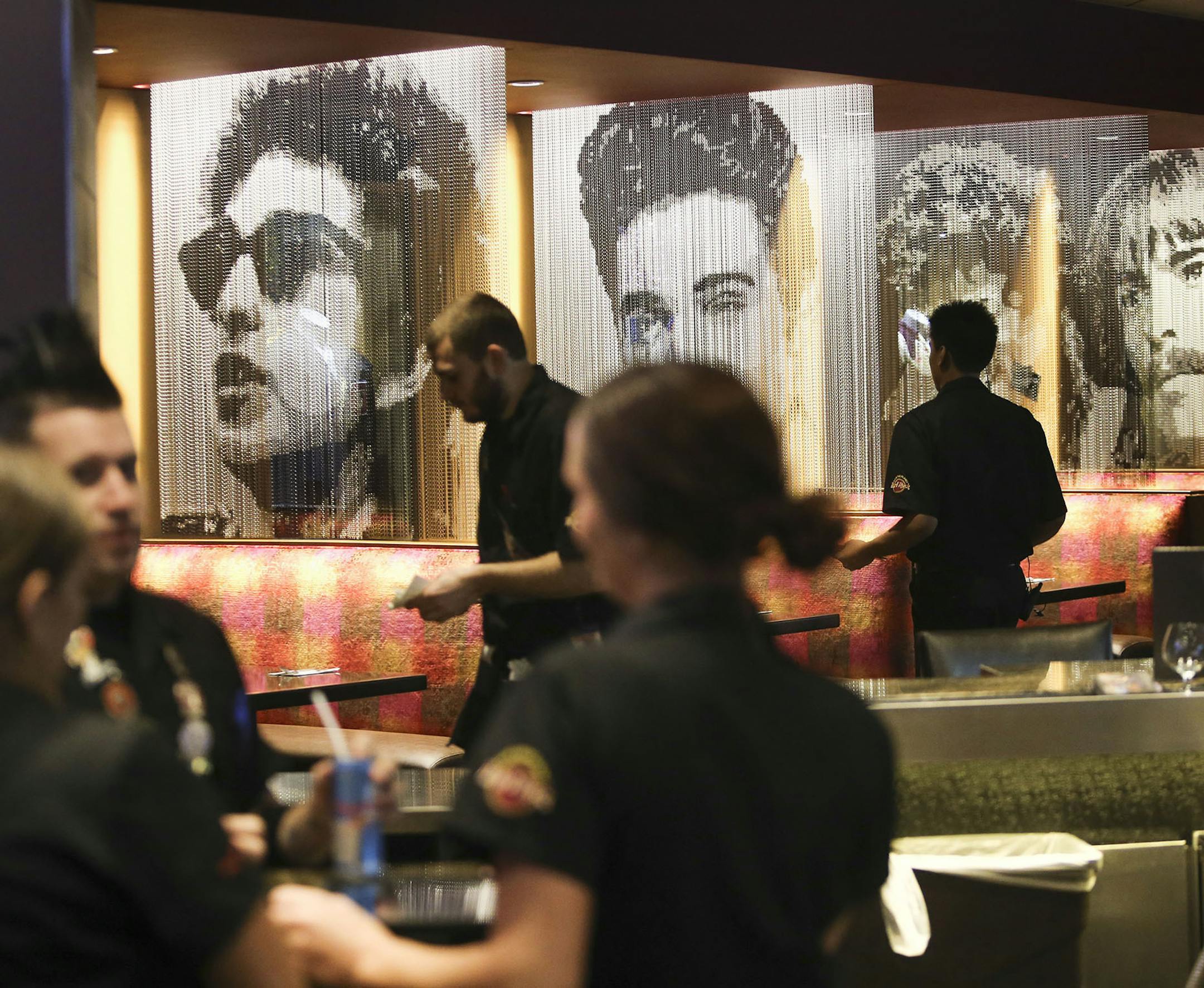 Individual dining booths seperated with the likenesses of Rock icons like Bob Dylan at the new Hard Rock Cafe that opened in the Mall of America last week and seen Wednesday, Sept. 3, 201, Bloomington, MN. The newly opened restaurant features museum quality Rock memorabilia from the likes of Prince, Bob Dylan, Nirvana and many more.] (DAVID JOLES/STARTRIBUNE)djoles@startribune.com Hard Rock Cafe opened last week at Mall of America after closing its Block E location several years ago. The theme r