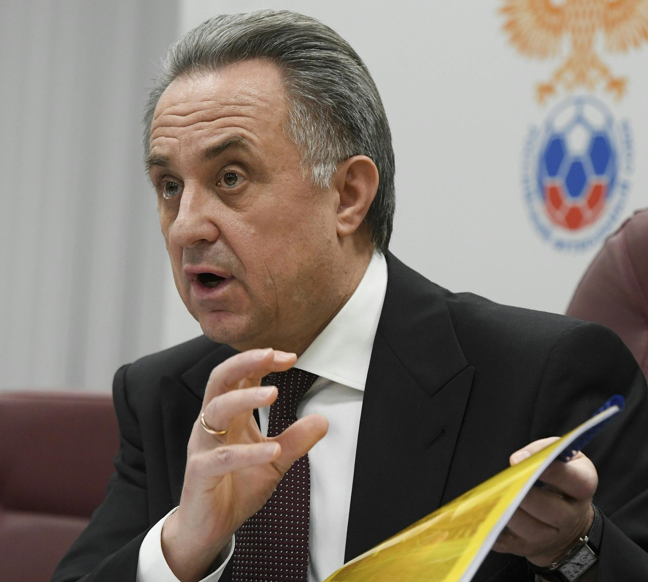 Vitaly Mutko, Russian Federation Deputy Prime Minister and Russia 2018 WCup Local Organising Committee Chairman, speaks to the media during a news conference following Russian Football Union meeting in Moscow, Russia, Monday, Dec. 25, 2017. Mutko, a Russian government official who has been dogged by allegations of involvement in doping, said Monday he would temporarily step down as president of the Russian Football Union. (AP Photo)