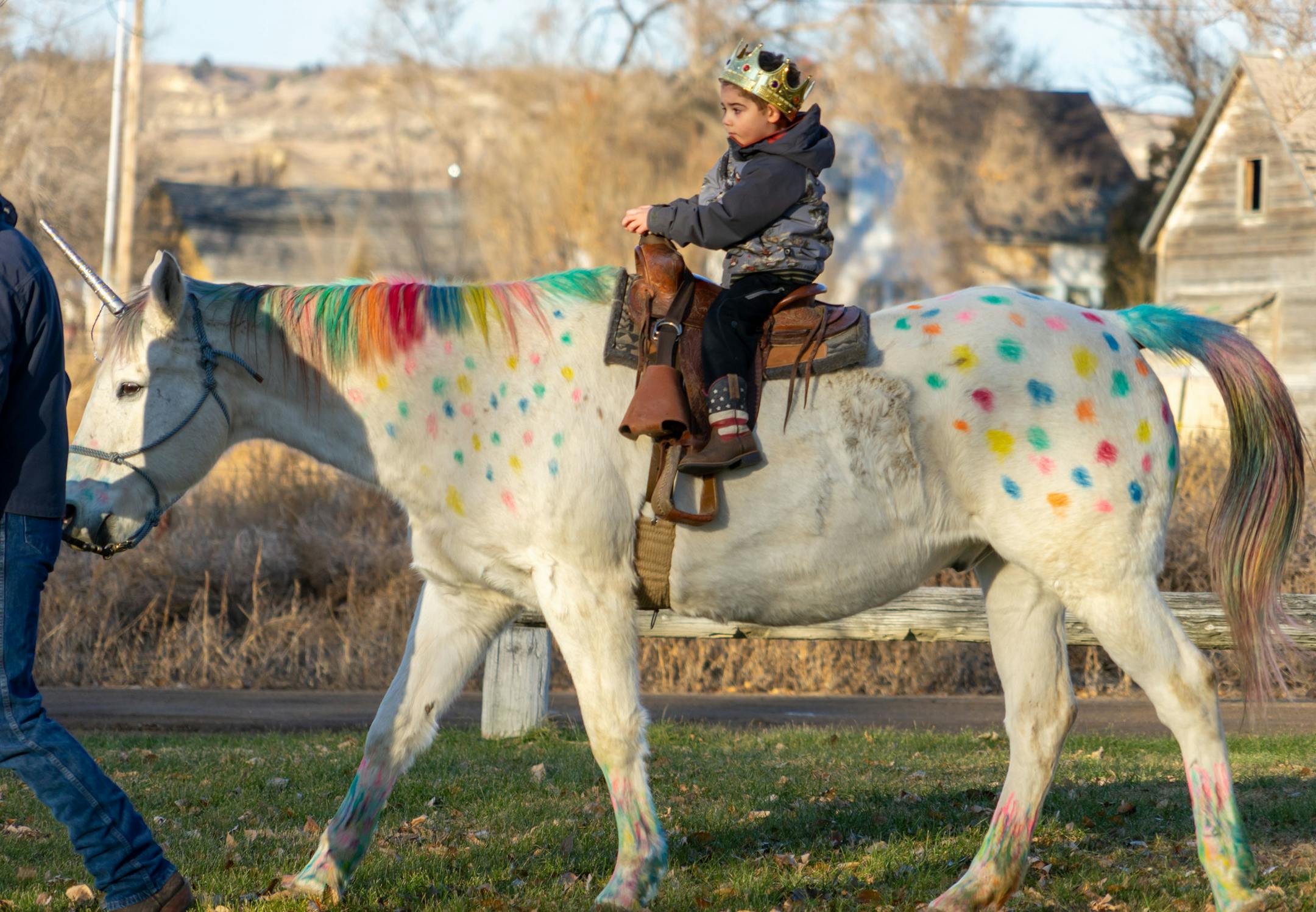 Wyatt Haas, 5, of Montana rides a horse decorated to look like a unicorn. MUST CREDIT: Courtesy of Tamara Choat.