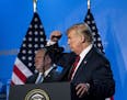 President Donald Trump is joined by Secretary of State Mike Pompeo at a news conference following the NATO summit in Brussels on Thursday, July 12, 20