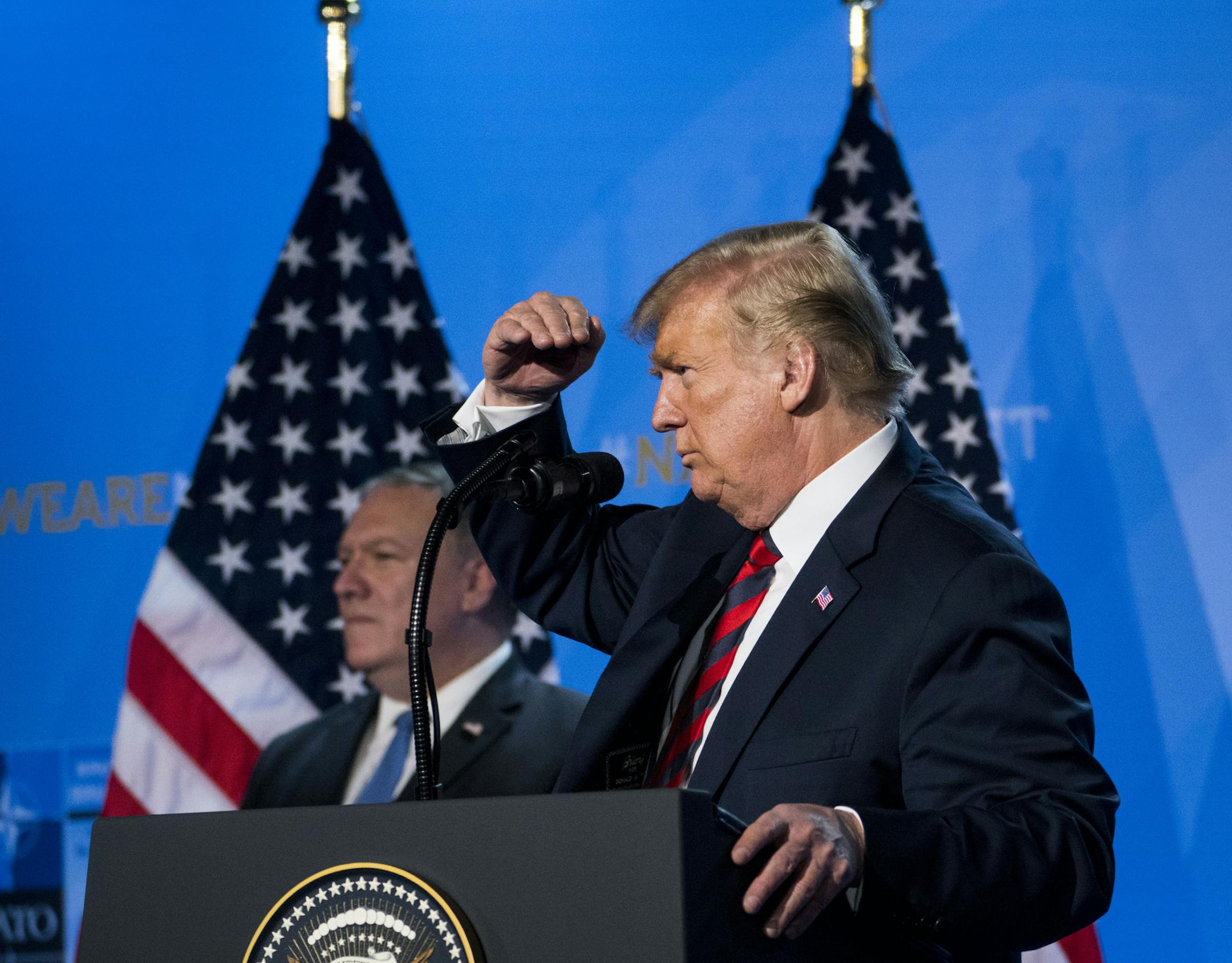 President Donald Trump is joined by Secretary of State Mike Pompeo at a news conference following the NATO summit in Brussels on Thursday, July 12, 2018. Trump strongly recommitted American support for the alliance on Thursday, declaring, ìI believe in NATO.î (Doug Mills/The New York Times)