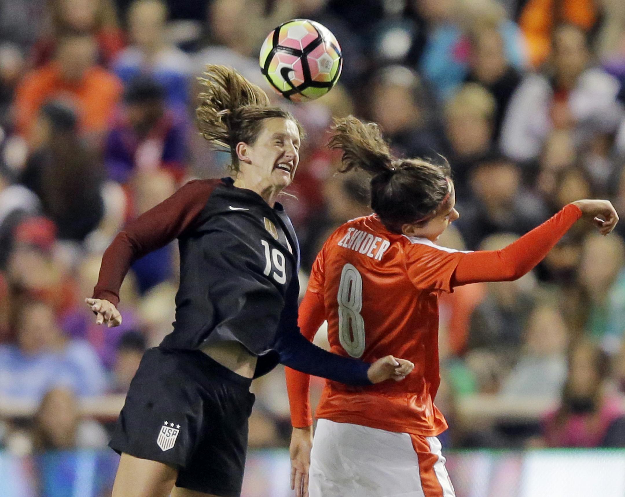 United States' Andi Sullivan (19) and Switzerland's Cinzia Zehnder go up for a head ball in the first half during an international friendly soccer match Wednesday, Oct. 19, 2016, in Sandy, Utah. (AP Photo/Rick Bowmer) ORG XMIT: UTRB104
