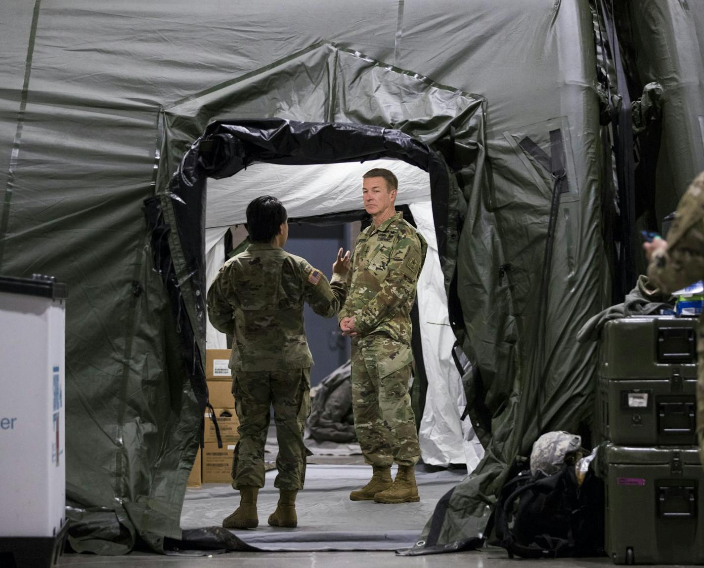 Chief of Staff of the Army, Gen. James McConville, gets a tour of the room a part of the operation room inside the field hospital for non-COVID-19 patients at CenturyLink Field Events Center on Wednesday. (Amanda Snyder/Seattle Times/TNS) ORG XMIT: 1624805