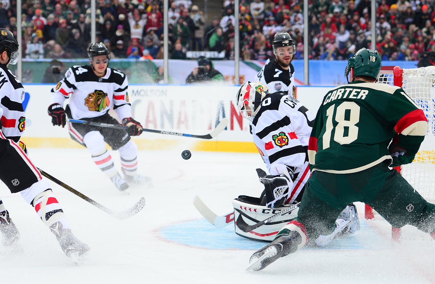 A shot by Minnesota Wild defenseman Matt Dumba (24) made it past Chicago Blackhawks goalie Corey Crawford (50) for a goal early in the first period. ] (AARON LAVINSKY/STAR TRIBUNE) aaron.lavinsky@startribune.com The 2016 Coors Light NHL Stadium Series game between the Minnesota Wild and the Chicago Blackhawks was held Sunday, Feb. 21, 2016 at TCF Bank Stadium in Minneapolis, Minn.