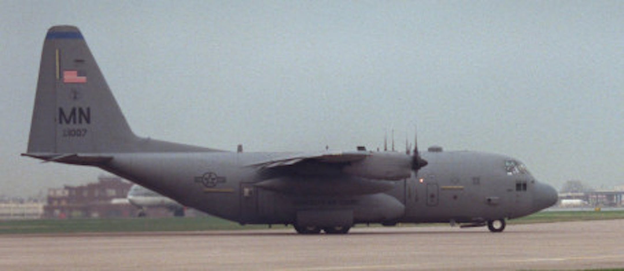 Family of the 28 Minnesota Air Guard members watched the Hercules C-130 taxi out to the runway before taking off.  The Minnesota unit was heading to Germany to help distribute relief supplies to refugees from Kosovo.