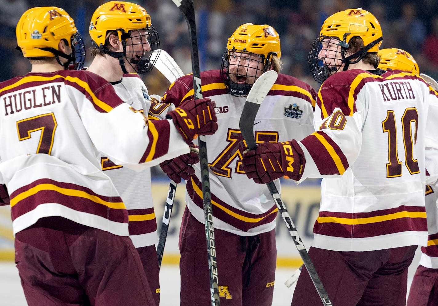 Luke Mittelstadt (20) of Minnesota celebrates with teammates after scoring his second goal in the third period Thursday, April 6, 2023, at Amalie Arena in Tampa, Fla. Minnesota Golden Gophers vs. Boston University in the semi-finals of the NCAA Frozen Four. ] CARLOS GONZALEZ • carlos.gonzalez@startribune.com.