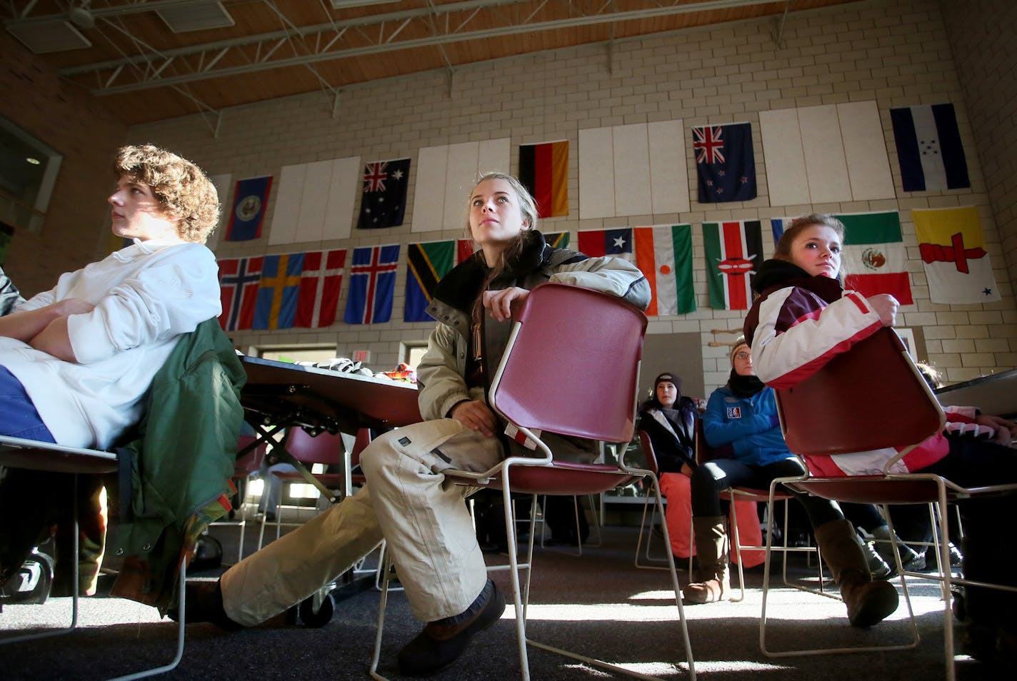 School of Environmental Studies students Michael Voto, left to right, Brittany Morrison and Brandy McCarthy listen to their teacher before heading out into the frigid cold to apply knowledge of navigation using a compass during a winter survival skills unit in Apple Valley Thursday, Feb. 5, 2015, in Apple Valley, MN.](DAVID JOLES/STARTRIBUNE)djoles@startribune.com The School of Environmental Studies in Apple Valley, otherwise known as the "zoo school," is having its 20 year anniversary this year