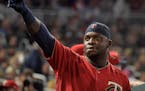 Minnesota Twins third baseman Miguel Sano gestures to fans after hitting a solo home run in the seventh inning against the Arizona Diamondbacks on Fri