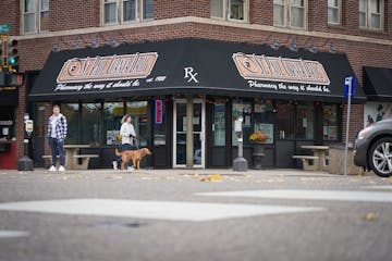 John Hoeschen, owner of St. Paul Corner Drug, made sure prescriptions didn’t slow while making room for customers to get vaccinations.