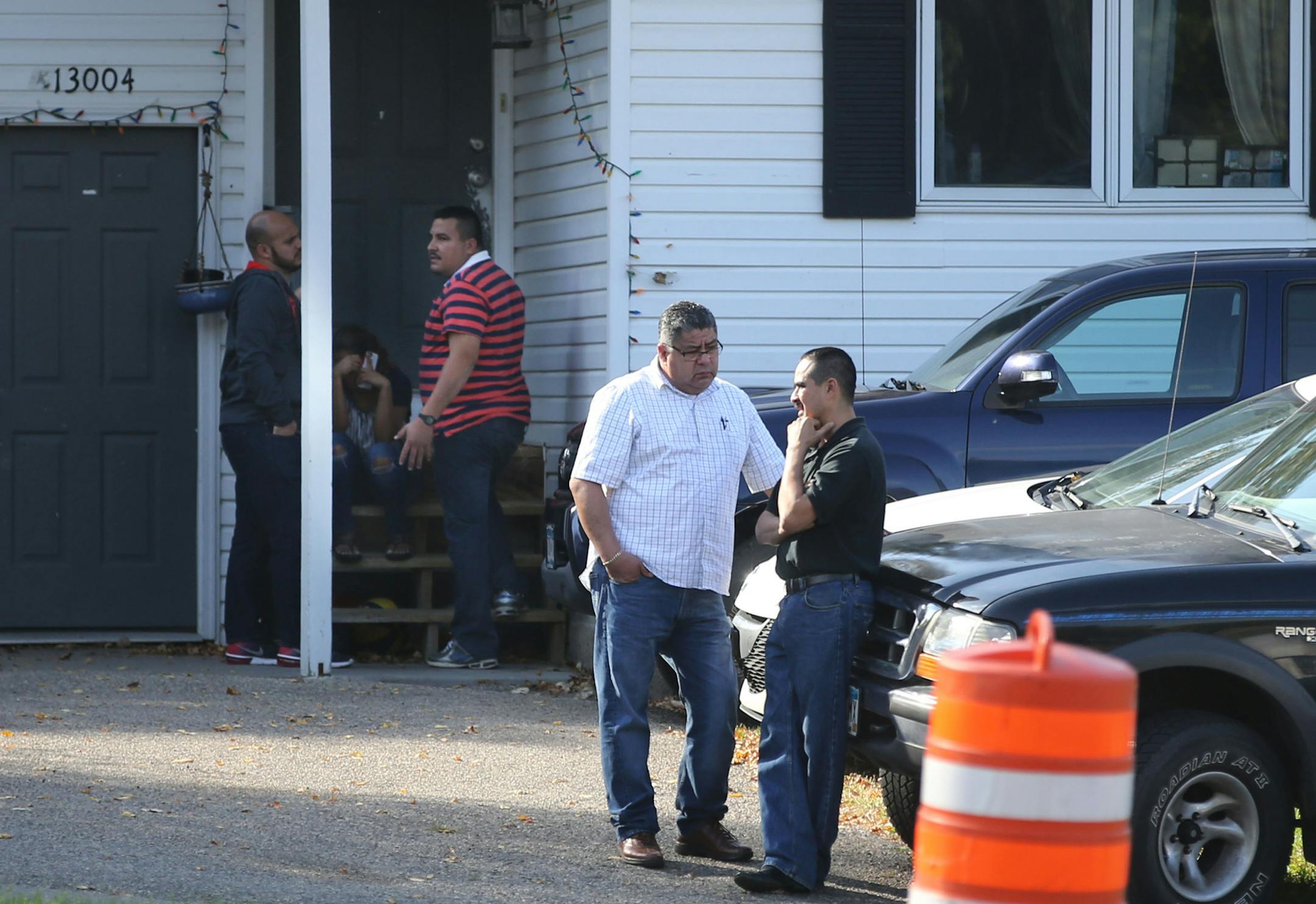 A large gathering of friends and family congregated at the home of the victim off of County Road 5, about a hundred yards from the accident site, where Monday evening a police chase after dark in two south metro suburbs ended with a fleeing van crashing into an SUV, leaving both drivers dead and seen Tuesday, Oct. 11, 2016, in Burnsville, MN.](DAVID JOLES/STARTRIBUNE)djoles@startribune.com A large gathering of friends and family congregated at the home of the victim off of County Road 5, about a