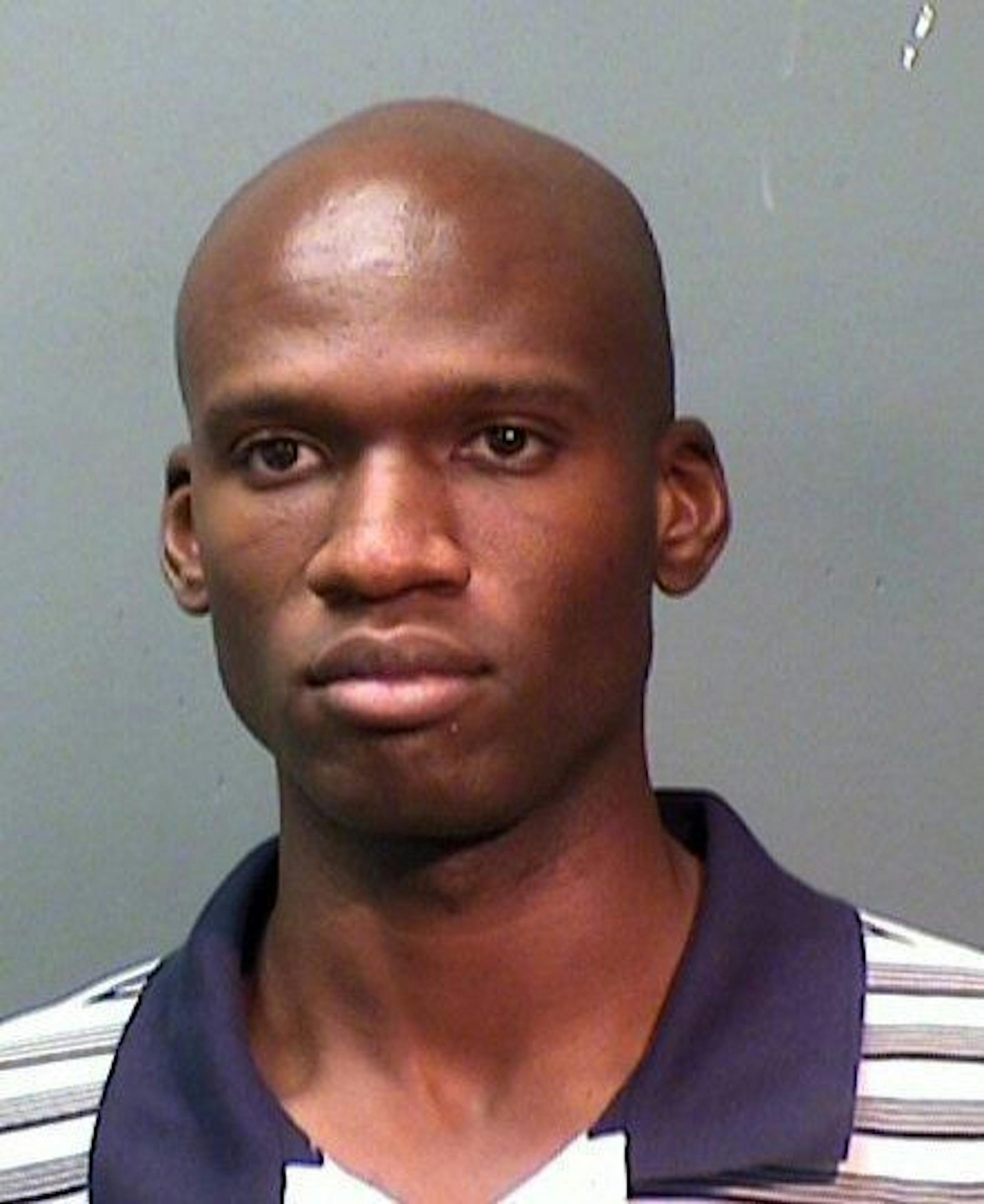 Booking mug of Aaron Alexis, arrested in September 2010, on suspicion of discharging a firearm in the city limits. Alexis is suspected to be the shooter at the Washington DC Navy Yard Monday, September 16, 2013.