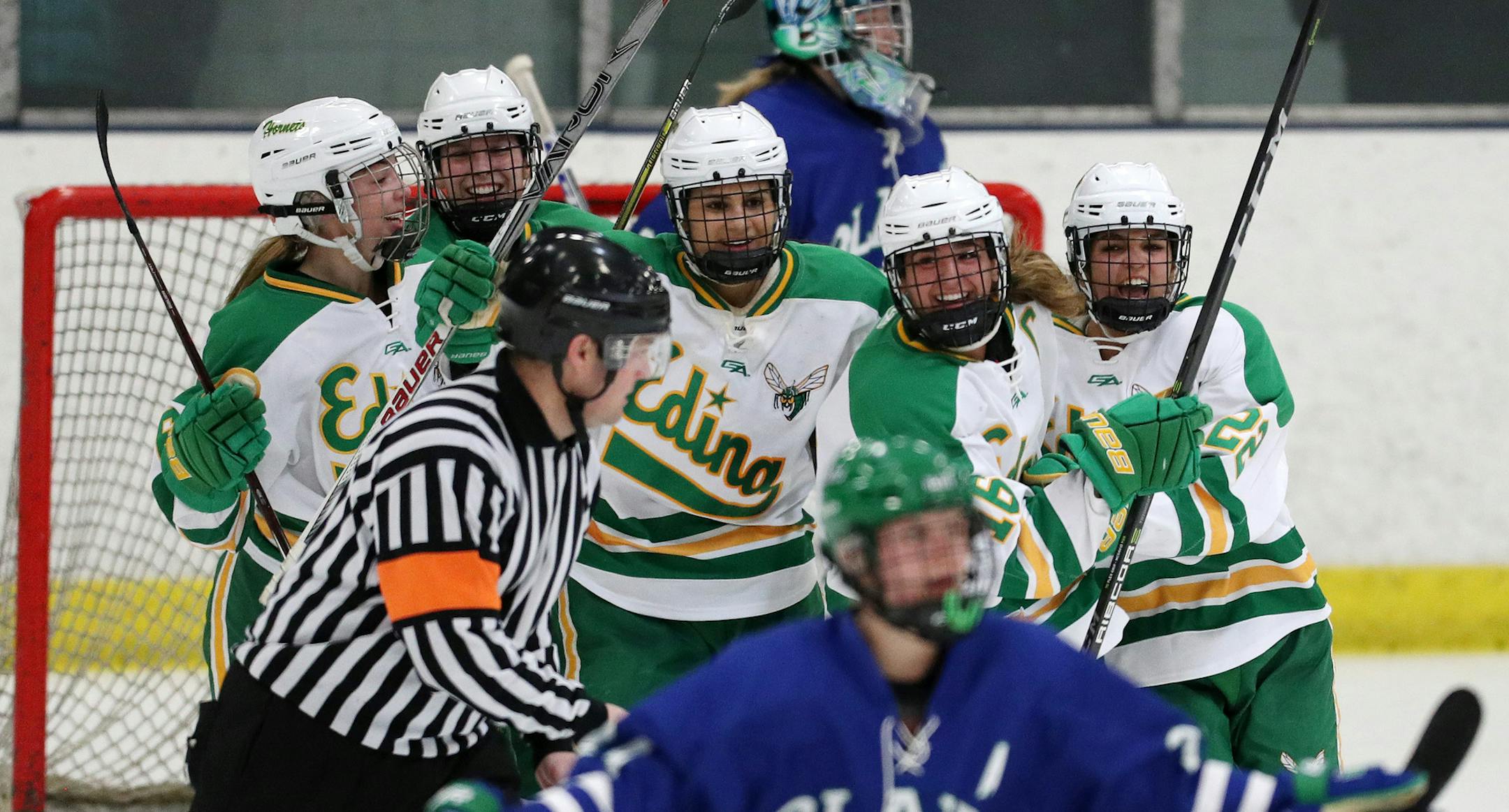 Edina High School forward Aliyah Lance (22) and Edina High School forward Emily Oden (16) celebrated with their teammates after scoring late in the second period. ] ANTHONY SOUFFLE ï anthony.souffle@startribune.com Players competed in an MSHSL Class 2A girls hockey game between Edina High School and the Blake School Friday, Feb. 16, 2018 at the Parade Ice Garden in Minneapolis.