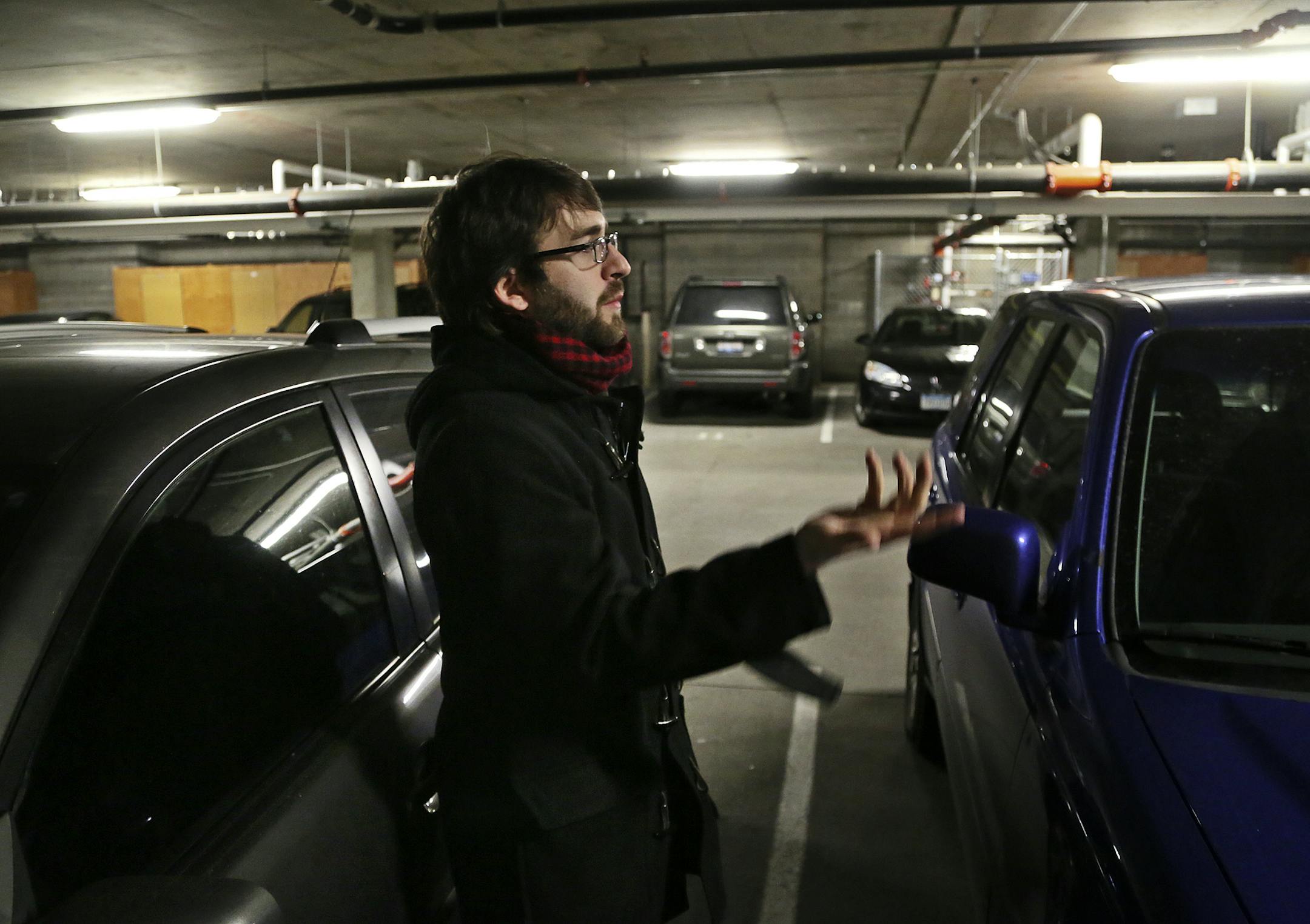 Brett Rogers, who recently moved to Minneapolis from New York City and lives in the Station 38 Apartments, was among the residents there who had their vehicles broken into inside the apartment's underground parking garage. Rogers said he didn't keep any valuable inside his vehicle and that a window was broken but nothing taken during the Nov. 12 burglary. He was seen Friday, Nov. 22, 2013, in Minneapolis, MN.](DAVID JOLES/STARTRIBUNE) djoles@startribune.com Four underground parking garages at ap