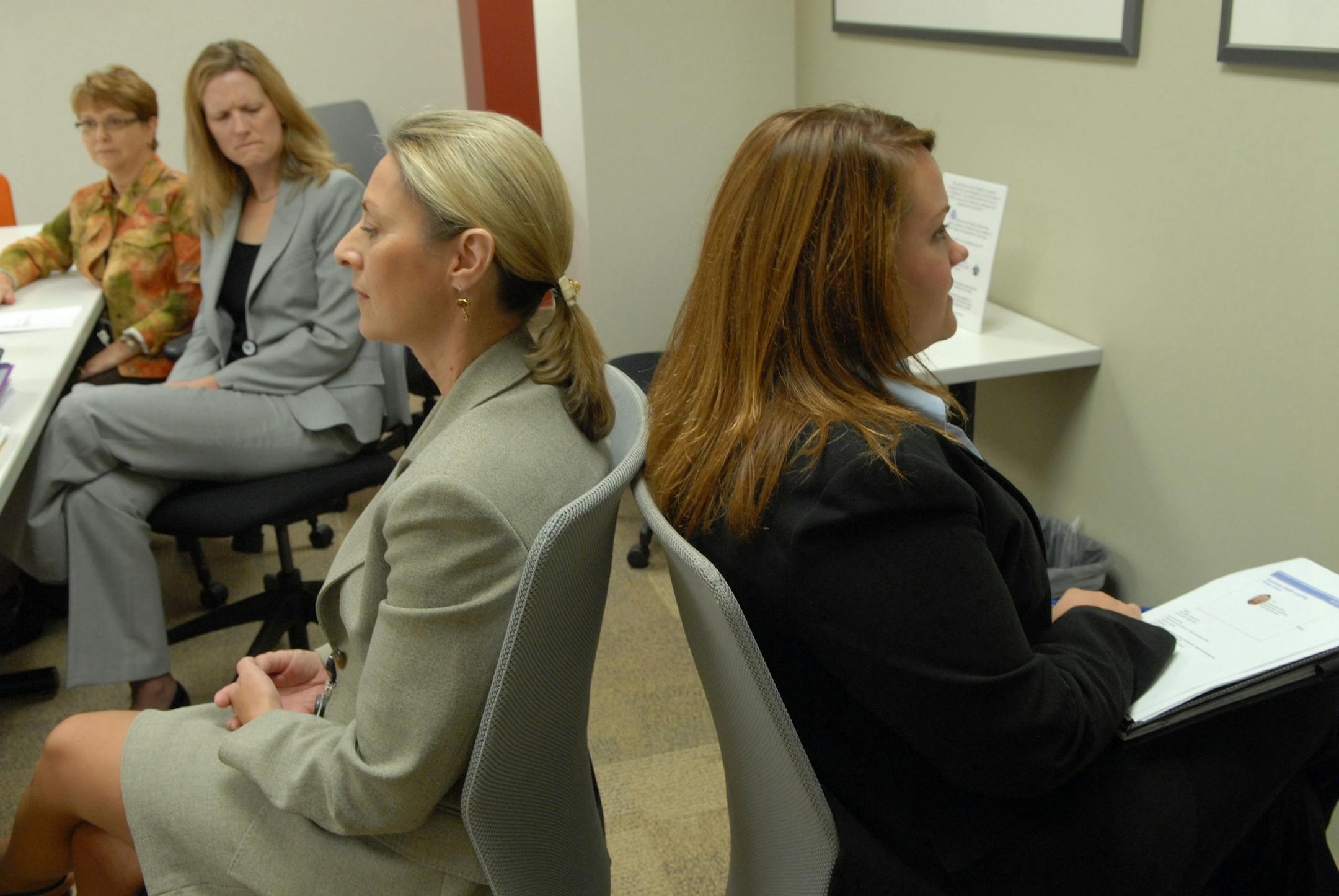 Holly Link, senior health coach, and Chelsea Anderson, manager of health and wellness coaching, worked on different coaching approaches during a recent training session at Medica Health.