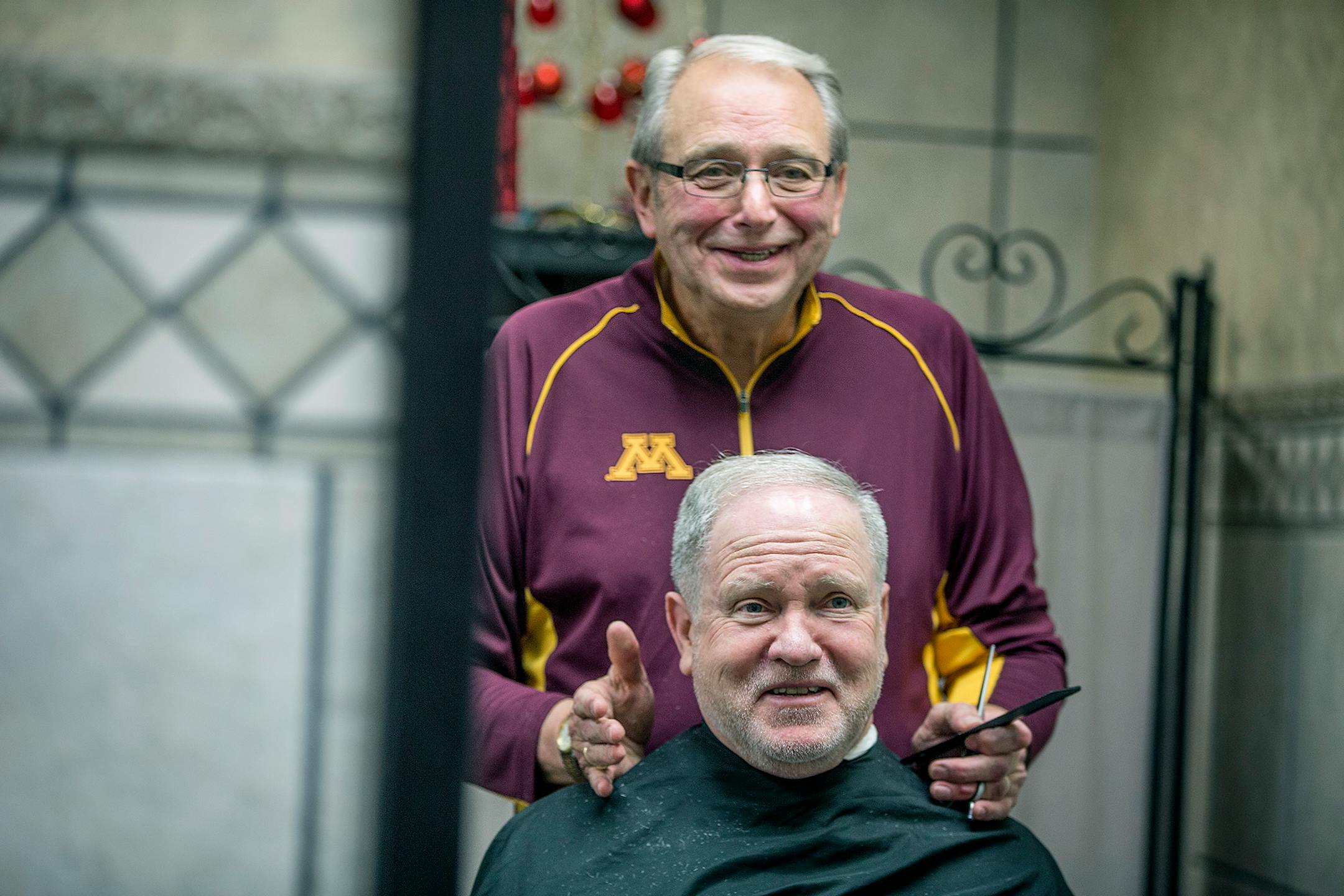 Barber John Vreeman gave long-time client Steve Stormoen his last haircut by Vreeman at Crossing Skyway Barbers & Salon in The Crossings building, Thursday, January 25, 2018 in downtown Minneapolis.