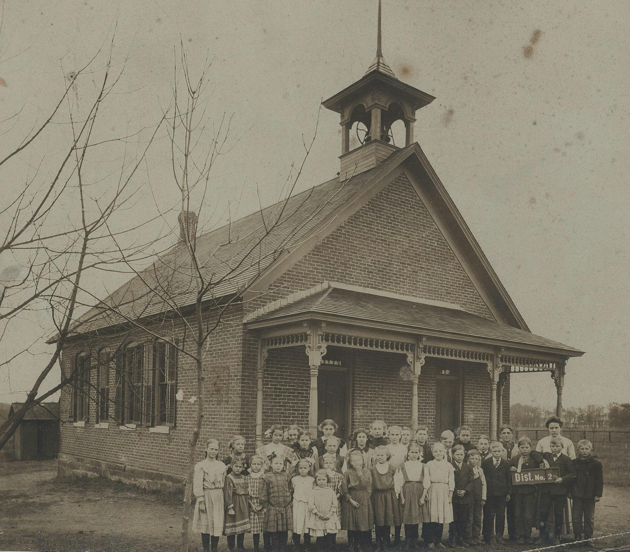 Students and teacher at Hay Creek School were assembled for a class portrait in 1910.