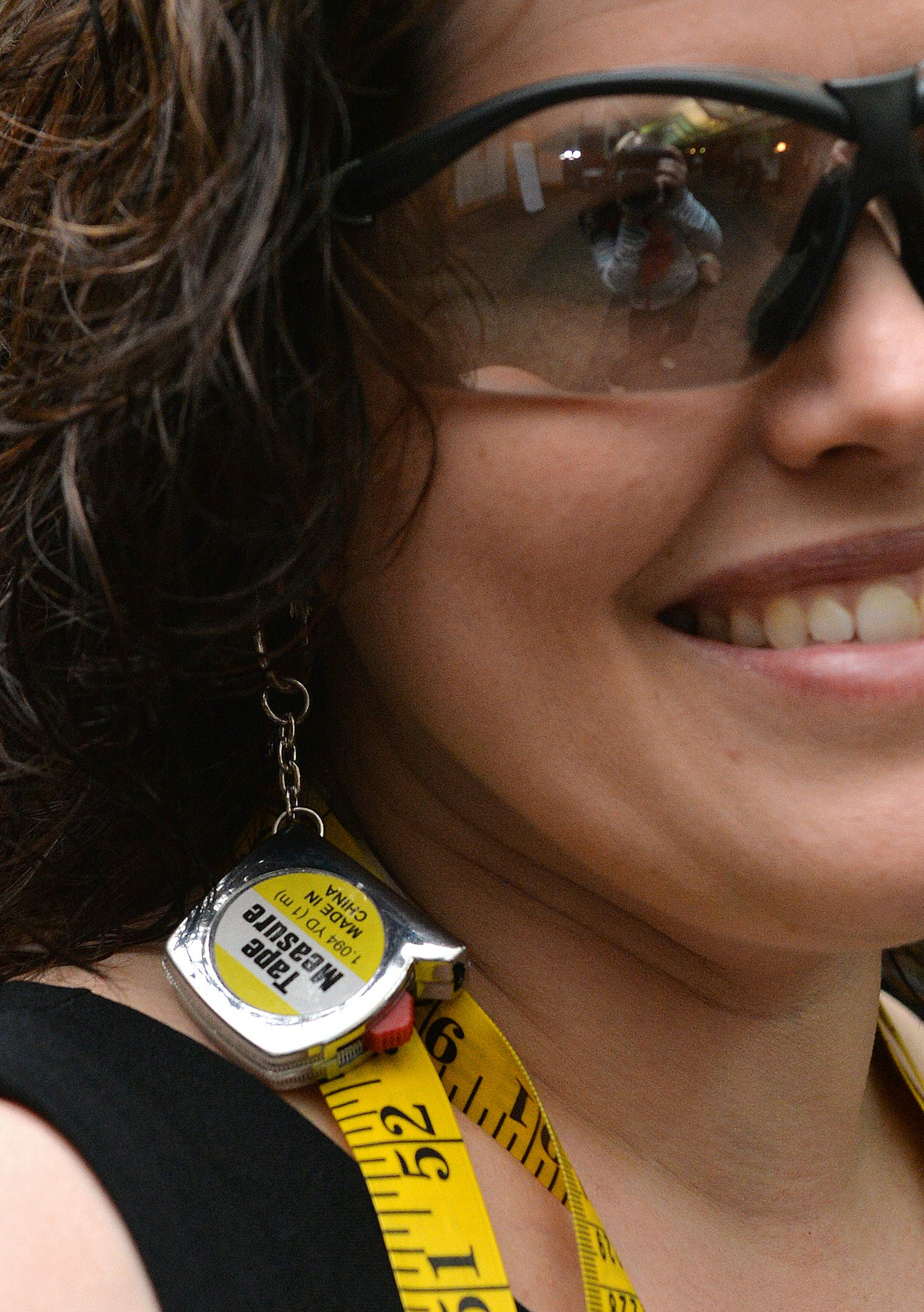 Heidi Sedlacek's handmade tape measure earrings. ] (SPECIAL TO THE STAR TRIBUNE/BRE McGEE) **Heidi Sedlacek