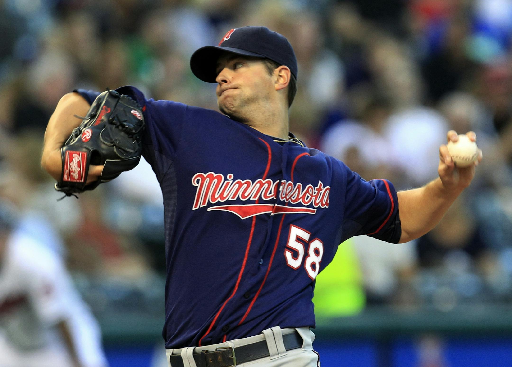 Minnesota Twins starting pitcher Scott Diamond delivers against the Cleveland Indians in the third inning of a baseball game, Monday, Aug. 6, 2012, in Cleveland.